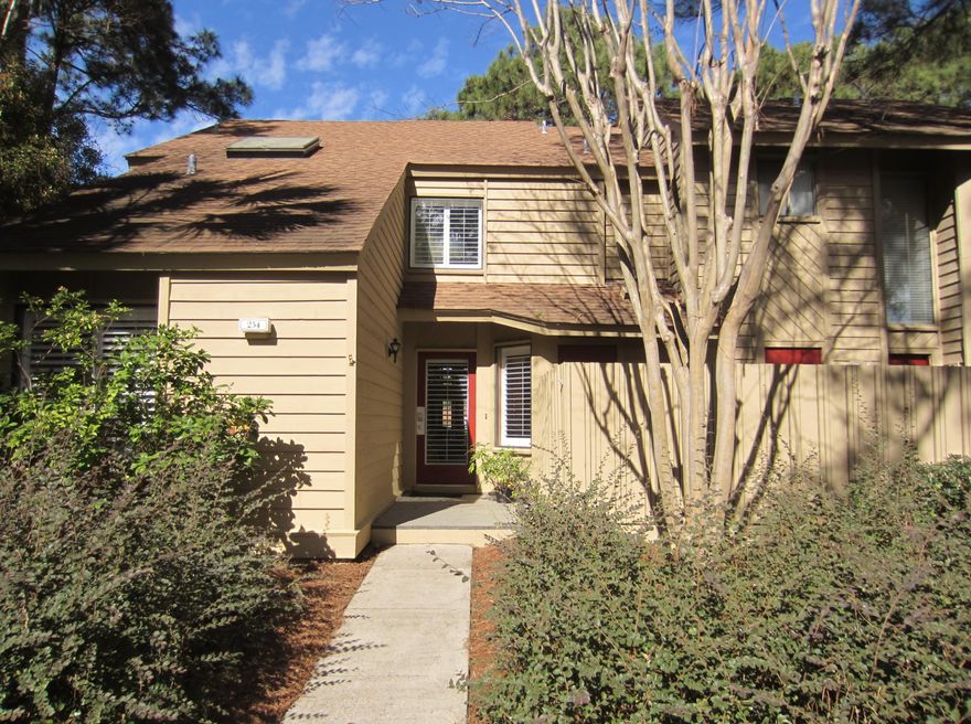 PRICE REDUCED!! MUST SEE!! Nestled amid the tall pines is this 3 bedroom, 3 bath corner townhome in Fairways. With views of the bay and Links #7, this fully furnished home has Tommy Bahama style furnishings, French doors that open to an extra large deck newly constructed with Trex, crown molding, wood burning double sided corner fireplace, 4'' wood plantation shutters throughout, master bedroom with sitting area, double vanities in master bath, huge separate shower with overhead skylight and large walk-in closet. Two spacious guest bedrooms each with their own bathrooms. The kitchen boasts granite countertops, newly added can ceiling lights and stained glass Tiffany-style lights over the breakfast bar. Round glass dining table with medallion back chairs and a Tiffany-syle chandelier.