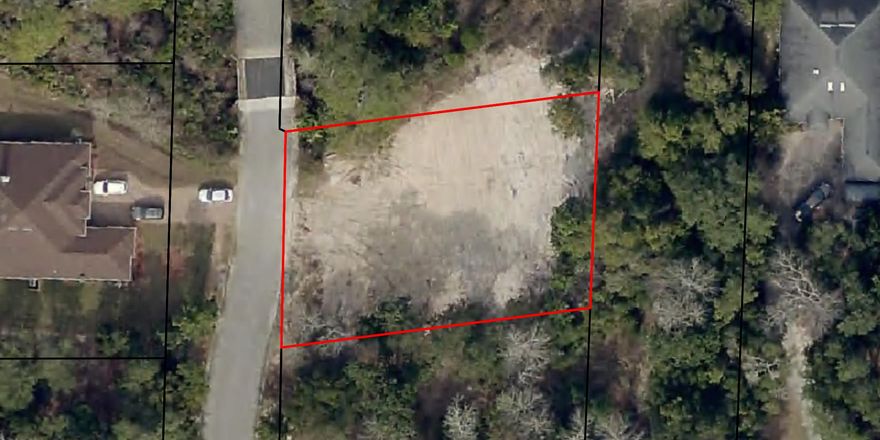 Motivated Seller. Nice homesite in a gated community. Survey has been done. Tap fees have been paid. Bring your builder and plans to build your dream home near the sound.
