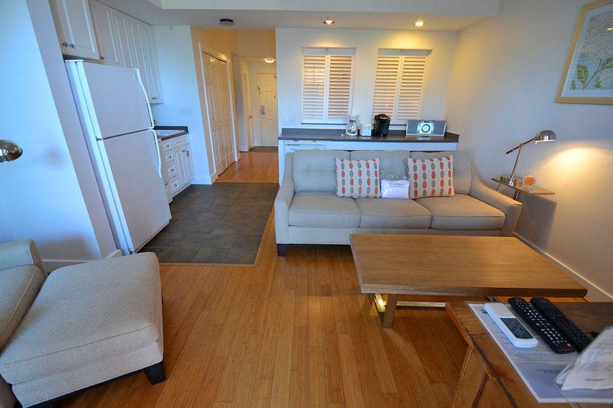 Currently the only condominium listed in Gulf Place Town Center - a quality constructed, low density, concrete building with only 20 total units... and this gem features high ceilings, full kitchen, central heating & cooling, large covered balcony, and a Gulf view with convenient deeded beach access! This condominium is being sold fully furnished 'turn key' with hardwood and tile flooring, breakfast bar, and a beautifully upgraded tiled bathroom with over-sized shower! Gulf Place is a convenient ''all-inclusive'' pet friendly coastal development featuring 3 swimming pools (one heated), outdoor hot tubs, tennis courts, shuffle board courts, BBQ grilling areas, large outdoor amphitheater with concerts and special events, elegant tropical landscaping throughout, bars & restaurants, caf,