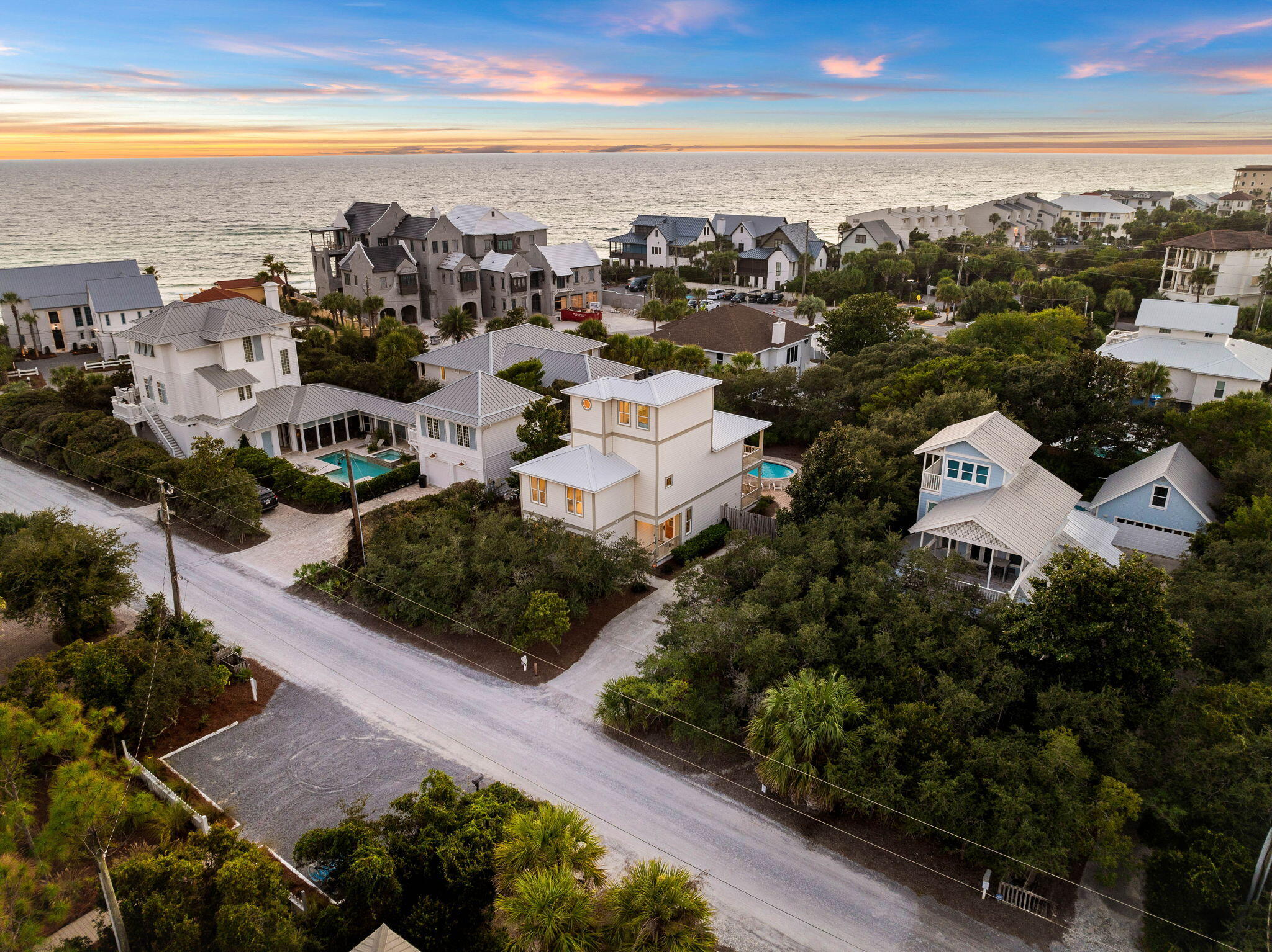 A Blue Mountain Beach Escape. Situated just three homes off the Gulf of Mexico, this incredible property offers the perfect blend of coastal living and privacy. Located on a hard-to-find .25-acre lot (75x150) south of 30A, and with three DEEDED neighborhood beach access points steps away, you'll enjoy effortless access to the sugar-white sands and turquoise waters of Blue Mountain Beach, which sits at the highest elevation point along Florida's entire Gulf Coast at 65 feet.As you step inside, the open living and dining areas welcome you with abundant natural light and a seamless connection to the kitchen. This spacious setup is perfect for family gatherings, with ample room for entertaining and easy access to the large covered patio, where you can enjoy views of the lush backyard and the heated swimming pool. Just beyond the living space, a first-floor bedroom offers flexibility for guests or family members.

On the second floor, the primary suite boasts a wrap-around balcony, ideal for taking in the Gulf breeze. Additional bedrooms on this level provide ample space for family and guests. The third-floor deck offers stunning Gulf views, perfect for watching the sunset after a day at the beach.

With Hardie board siding, a bunk room, and a large fenced backyard, this home is designed for laid-back coastal living. The proximity to local favorites like Blue Mountain Beach Bakery, Redfish Taco, The Creamery, and Cowgirl Kitchen makes this location unbeatable for those seeking both relaxation and convenience.

Come and discover why everyone loves living in Blue Mountain Beach. Whether it's for the unbeatable beach access, the peaceful elevation, or the vibrant local community, this home offers it all.