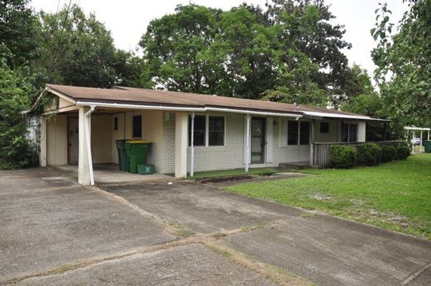 REO. Fixer upper special! This home is waiting for someone to breathe new life into it and return it back to its former glory. This home comes with a 1 car carport, workshop/hobby room, fireplace, and a fully privacy fenced backyard. Once fixed up, this home could be fantastic for first time home buyers or even as a rental property. Located within minutes to Hurlburt Field and is also located close to shopping. Call today to view this home, it will not last long! Being sold AS IS. Property was built prior to 1978 and lead based paint may potentially exist.