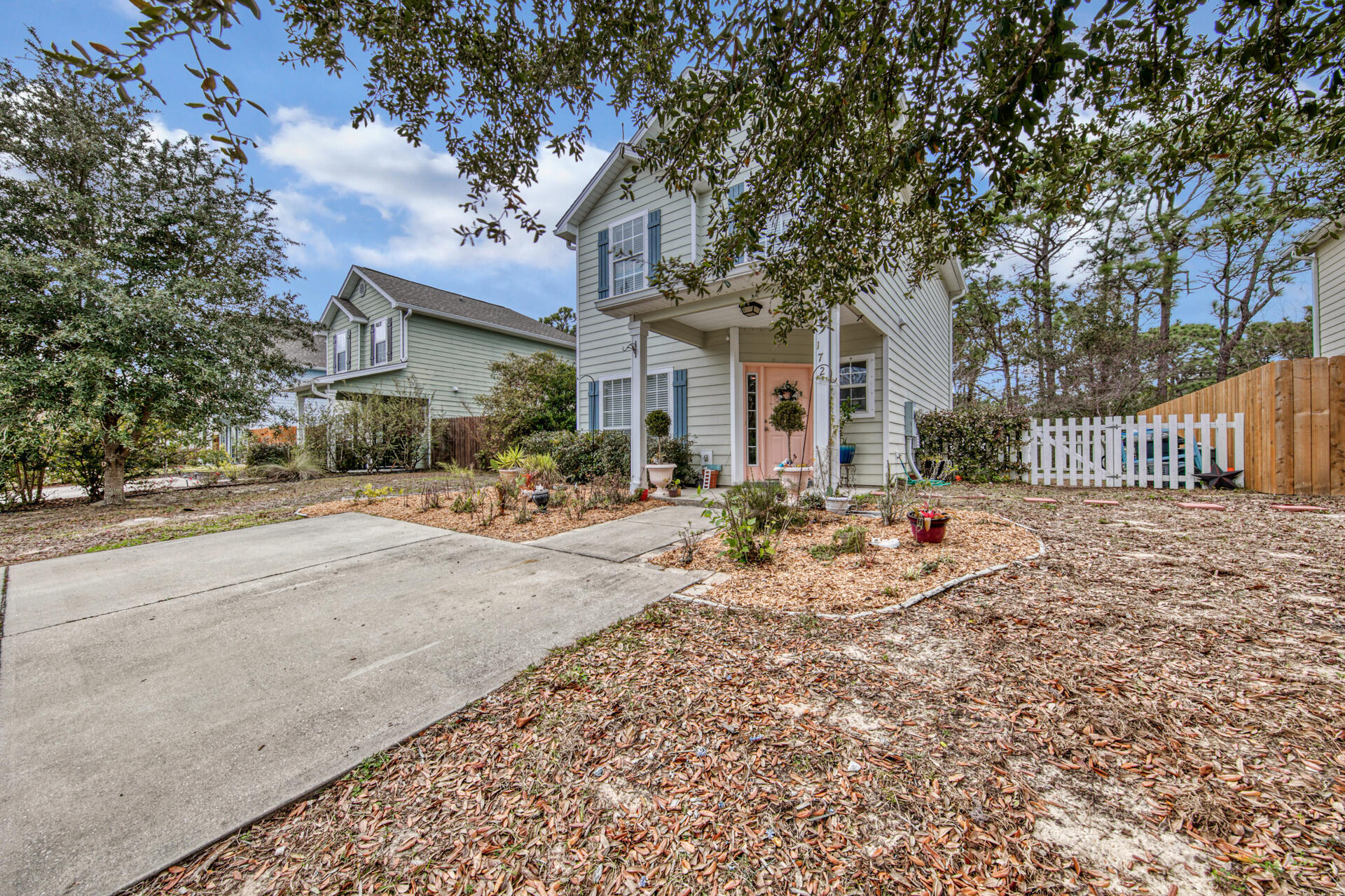 You will LOVE this family friendly community nestled just minutes from the world famous beaches of 30A & the Choctawhatchee Bay! This low maintenance 3BR/3BA two story home, has a desirable open floor plan; granite, stainless steel & NEW LVP wood floors throughout! Your privacy is elevated as this home is positioned along a serene, wooded horse farm.Enjoy fires under the stars, entertaining in the back AND two side yards, completely fenced in with NEW 6ft Privacy fencing. Perfect for your pets! Low HOA's make this home truly affordable while still allowing owners to be part of a great community environment. Lined with street lights, Water Oaks is located along a low traffic, private drive. Ideal for primary residence or investment property for long term rental. Call a local today!