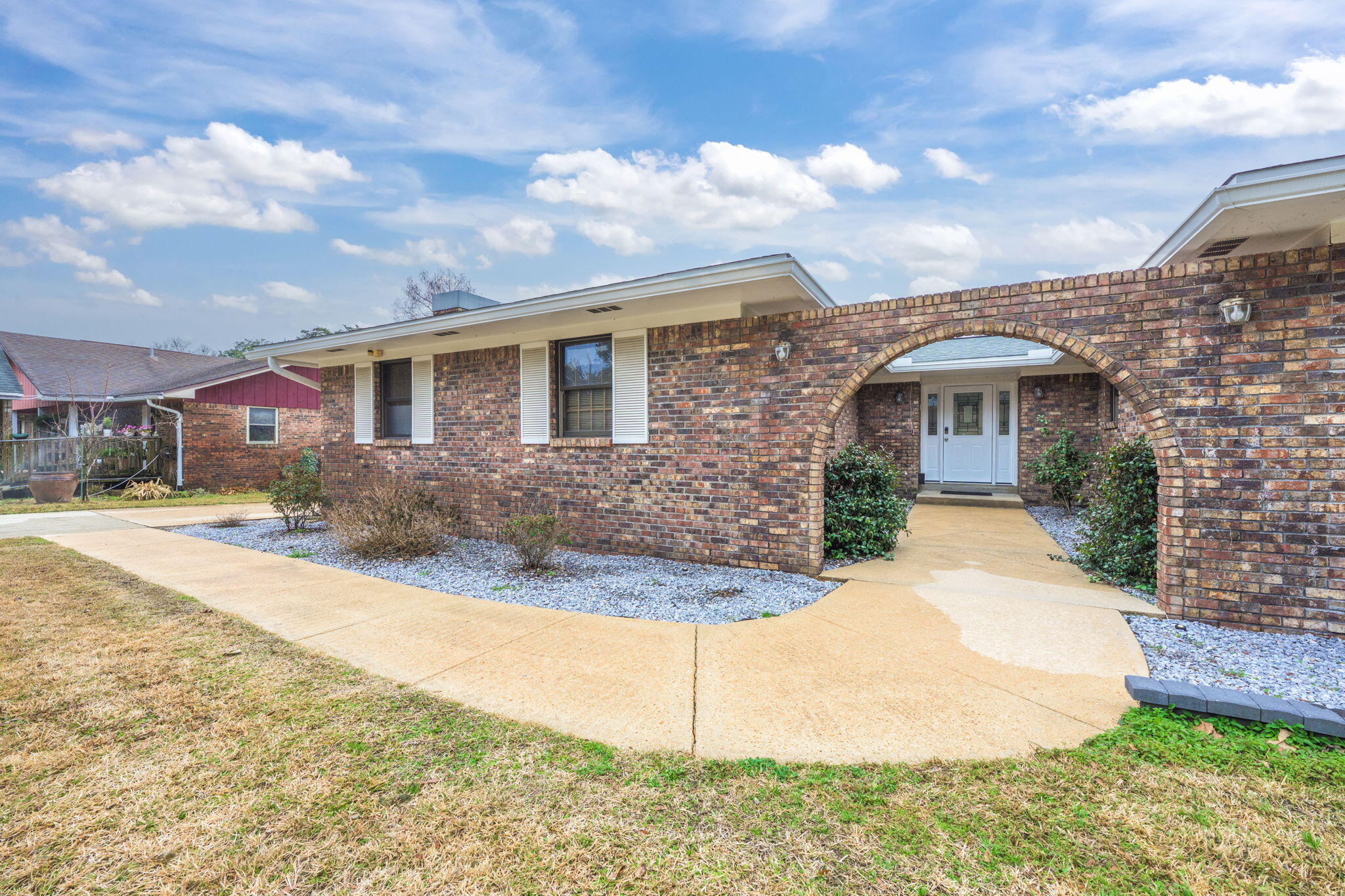 VA Assumption to VA Buyer - 2.75%, pymt 2,265.97! With its modern updates, spacious design, and prime location in the Overbrook community, this Fort Walton Beach home offers comfort, style, and a true retreat near the Emerald Coast. Perfect for those looking to enjoy a peaceful, well-appointed home close to beautiful beaches, nearby military bases, and all essential amenities. Welcome to 713 Overbrook, a charming home nestled in the peaceful Overbrook community of Fort Walton Beach. This hidden gem offers a serene, sidewalk-lined neighborhood while being just minutes away from all the essentials. Featuring a separate detached garage with an attached carport, you'll have plenty of room for extra parking, or to store your RV or boat. This all-brick home with an attractive archway entrance combines privacy with convenience. It's just 7 miles to Hurlburt Field, or Eglin Air Force Base, and only 10 minutes to the pristine beaches of Okaloosa Island. Nearby, you'll find Walmart, Sam's Club, grocery outlets, parks, schools, recreational facilities, and a variety of shops and services, making this location ideal for both work and play. This home is full of thoughtful upgrades, including a newer roof (2021) and rain gutters (2024). Enjoy the ease of a smart sprinkler system with a B-Hyve Smart Controller, and a whole house generator for peace of mind. The spacious 800 sq. ft. paved patio, complete with an open firepit, and the 400 sq. ft. deck provide ample space for outdoor relaxation.
Inside, you'll find a home with modern technology, including Vivint Home Security, Peachtree Patio doors and windows, Honeywell Smart Thermostat, and a Ubiquiti home network. With a flexible 5-bedroom, 3-bath layout, the home also features a private mother-in-law suite, perfect for guests or multi-generational living. The kitchen is a chef's dream with sleek quartz countertops, stainless steel appliances, a double oven, and a smooth cooktop range with plenty of space. It features not only a breakfast nook, but a breakfast bar and a separate dining area for those holiday gatherings. Master bedroom has double doors to outdoor deck overlooking the backyard. Master bath has tiled tub/shower with dual shower heads. With its spacious floor plan, modern updates, and unbeatable location, 713 Overbrook offers the perfect blend of comfort and style. Whether you're relaxing at home, exploring nearby beaches, or commuting to work, this home offers an ideal retreat in the heart of Fort Walton Beach.