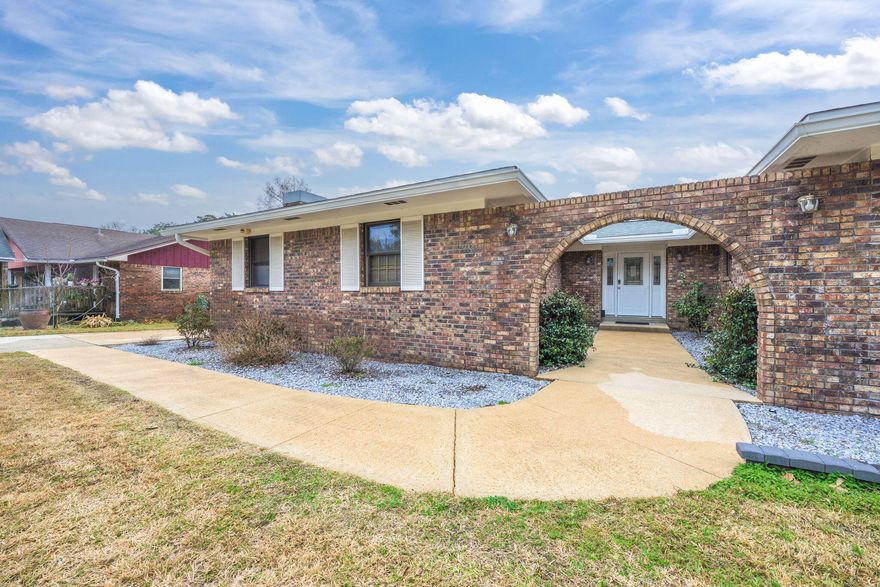 VA Assumption to VA Buyer - 2.75%, pymt 2,265.97! With its modern updates, spacious design, and prime location in the Overbrook community, this Fort Walton Beach home offers comfort, style, and a true retreat near the Emerald Coast. Perfect for those looking to enjoy a peaceful, well-appointed home close to beautiful beaches, nearby military bases, and all essential amenities. Welcome to 713 Overbrook, a charming home nestled in the peaceful Overbrook community of Fort Walton Beach. This hidden gem offers a serene, sidewalk-lined neighborhood while being just minutes away from all the essentials. Featuring a separate detached garage with an attached carport, you'll have plenty of room for extra parking, or to store your RV or boat. This all-brick home with an attractive archway entrance combines privacy with convenience. It's just 7 miles to Hurlburt Field, or Eglin Air Force Base, and only 10 minutes to the pristine beaches of Okaloosa Island. Nearby, you'll find Walmart, Sam's Club, grocery outlets, parks, schools, recreational facilities, and a variety of shops and services, making this location ideal for both work and play. This home is full of thoughtful upgrades, including a newer roof (2021) and rain gutters (2024). Enjoy the ease of a smart sprinkler system with a B-Hyve Smart Controller, and a whole house generator for peace of mind. The spacious 800 sq. ft. paved patio, complete with an open firepit, and the 400 sq. ft. deck provide ample space for outdoor relaxation.
Inside, you'll find a home with modern technology, including Vivint Home Security, Peachtree Patio doors and windows, Honeywell Smart Thermostat, and a Ubiquiti home network. With a flexible 5-bedroom, 3-bath layout, the home also features a private mother-in-law suite, perfect for guests or multi-generational living. The kitchen is a chef's dream with sleek quartz countertops, stainless steel appliances, a double oven, and a smooth cooktop range with plenty of space. It features not only a breakfast nook, but a breakfast bar and a separate dining area for those holiday gatherings.  Master bedroom has double doors to outdoor deck overlooking the backyard. Master bath has tiled tub/shower with dual shower heads. With its spacious floor plan, modern updates, and unbeatable location, 713 Overbrook offers the perfect blend of comfort and style. Whether you're relaxing at home, exploring nearby beaches, or commuting to work, this home offers an ideal retreat in the heart of Fort Walton Beach.
