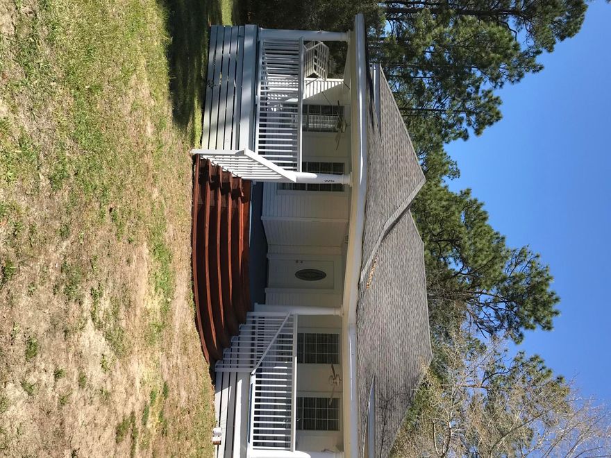This newly remodeled Florida Cottage was just renovated and is ready for a new owner. The home has fresh paint, new wood porch, and flooring. The oversized front porch is perfect for the afternoons and sitting in the porch swing. This 3 bedroom and 2 bathroom home has a split floor plan and plenty of extra room. located at the end of a paved road, there is plenty of privacy. This home is a must see and easy to tour.