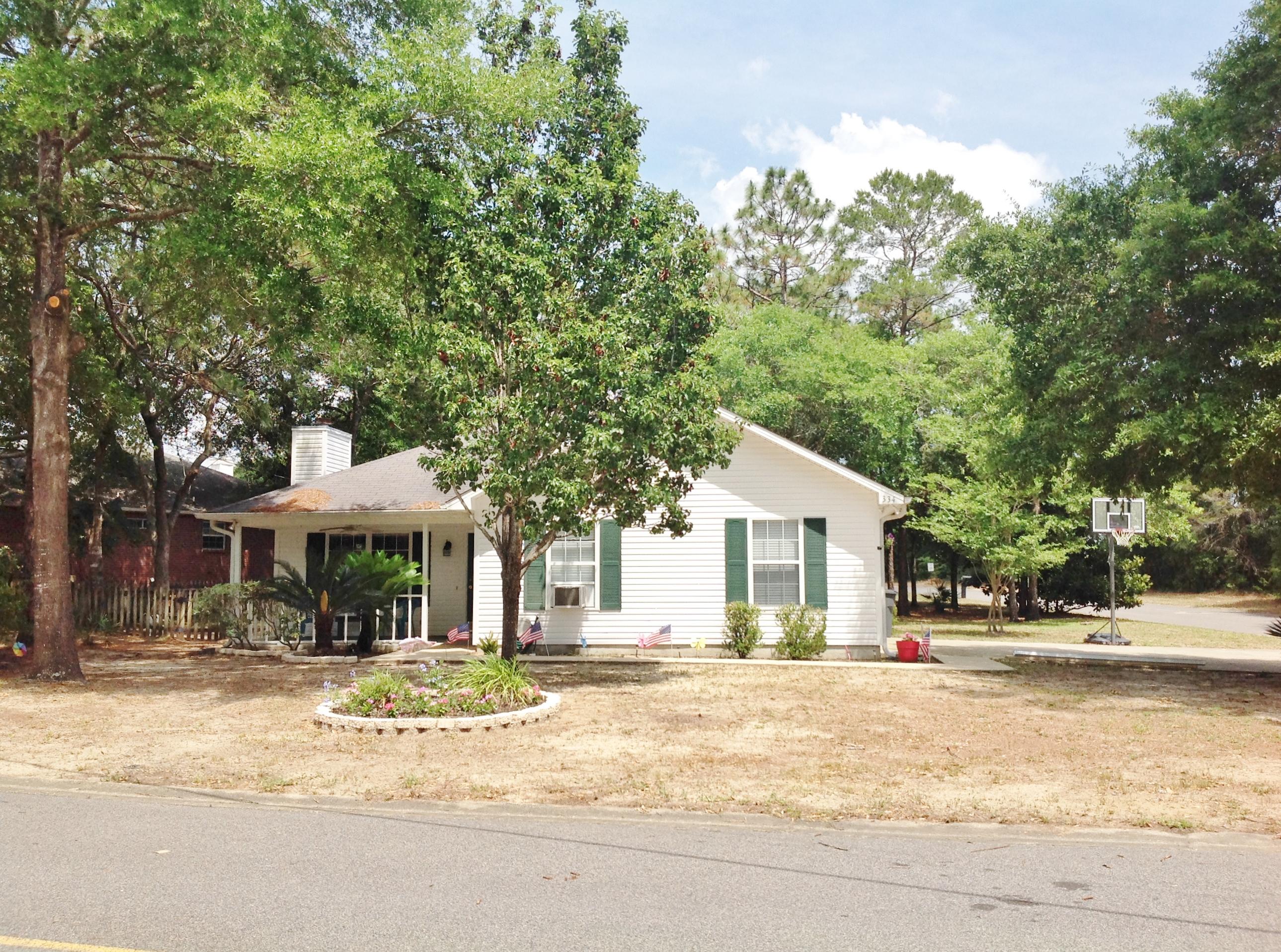 This home situated on a large, corner lot, has something for everyone! The incredible, kitchen is a chef's delight with tons of cabinets, gas stove, movable, center island, 2 pantry's, and new dishwasher and microwave. There's ambient, under cabinet lighting as well. Over sized garage comfortably fits 2 cars, with still more room for storage, window A/C, hanging shelves, work bench, and pull down stairs with decking in attic. Living room has vaulted ceiling and gas fireplace. Large master bedroom also has vaulted ceiling, plus wood floors and walk in closet. Master bath features double vanities. French doors in kitchen and master both lead out to large patio, plumbed with gas for grilling. Fully fenced back yard has plenty of room for a pool. Brand NEW roof with 40 year architectural