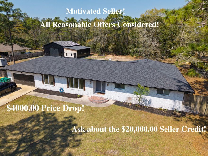 Rare opportunity to own a nearly one-acre fully renovated property with a saltwater pool, large shop with ADU, boat access, and wooded privacy in Fort Walton Beach.This exceptional property backs up to peaceful wooded surroundings and offers a rare combination of privacy, space, and extensive modern upgrades. The home has been extensively renovated from top to bottom and features a fully remodeled kitchen with new cabinetry, granite countertops, and new appliances, beautifully updated bathrooms, and all new windows and exterior doors. The inviting living area is highlighted by an electric fireplace, creating a warm focal point for the home. All bedrooms are generously oversized, and the primary suite has been expanded to include a massive custom walk-in closet created from a converted bedroom, offering exceptional dressing and storage space rarely found in homes of this size. Major system upgrades include a new roof and A/C replaced in 2024, providing peace of mind for years to come.

Step outside to enjoy the saltwater pool installed in 2024, complemented by new irrigation and landscape lighting throughout the property. The fully fenced yard includes a 20-foot access gate, allowing easy entry for boats, RVs, trailers, or additional vehicles to the rear of the property.

A standout feature is the 30x40 shop built last year, which is spray-foam insulated for superior energy efficiency and includes a 750 sq ft ADU with 2 bedrooms and 1 bath. This flexible space is ideal for guest quarters, rental income potential, multi-generational living, or a private office or studio. Additional highlights include an oversized temperature-controlled garage and a chicken coop built last spring, adding charm and functionality.

With nearly an acre of land, wooded privacy, extensive renovations, boat and RV access, and a versatile shop with ADU, this property offers a unique opportunity just minutes from the beaches, shopping, dining, and military bases in Fort Walton Beach.