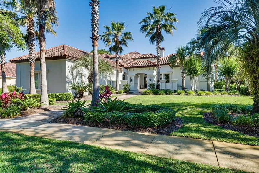 Experience lakefront living at its finest with this gorgeous home located at Sandestin Golf and Beach Resort's exclusive Burnt Pine community. Beautifully designed, no detail has been overlooked. This stunning Mediterranean inspired villa is characterized by traditional stucco exterior and interior custom features that include rich stone, textured woods, and exquisite wall coverings. The well-appointed first floor offers dramatic ceilings with tray lighting throughout, a private master wing, separate guest suite, and ample living areas. A temperature-controlled wine cellar complete a connoisseur's dream. The spacious family room flows graciously into an outdoor oasis where you will find an entertainer's paradise including a large climate controlled summer kitchen, stone fireplace, seating