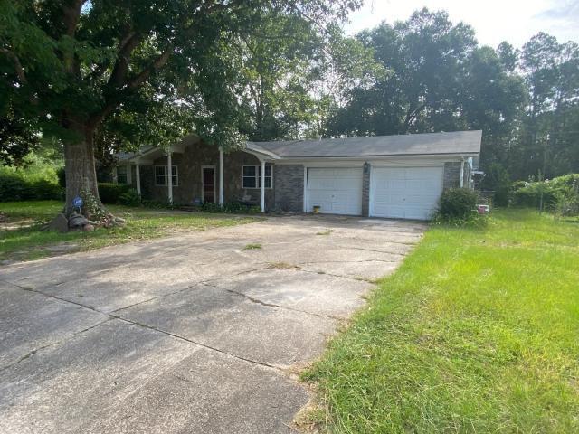 Lowest priced 3/2 investor special by 50k! Property needs FULL rehab including trash-out. Two car garage. Voluntary HOA. Located in a quiet neighborhood just 20 minutes from Pensacola Beach! Close to shopping, dining, and easy access to major roads!Cash only. Sold AS-IS. All inspections must be done prior to offering. Seller will not remove any personal property. Room measurements are approximate, please verify if important.