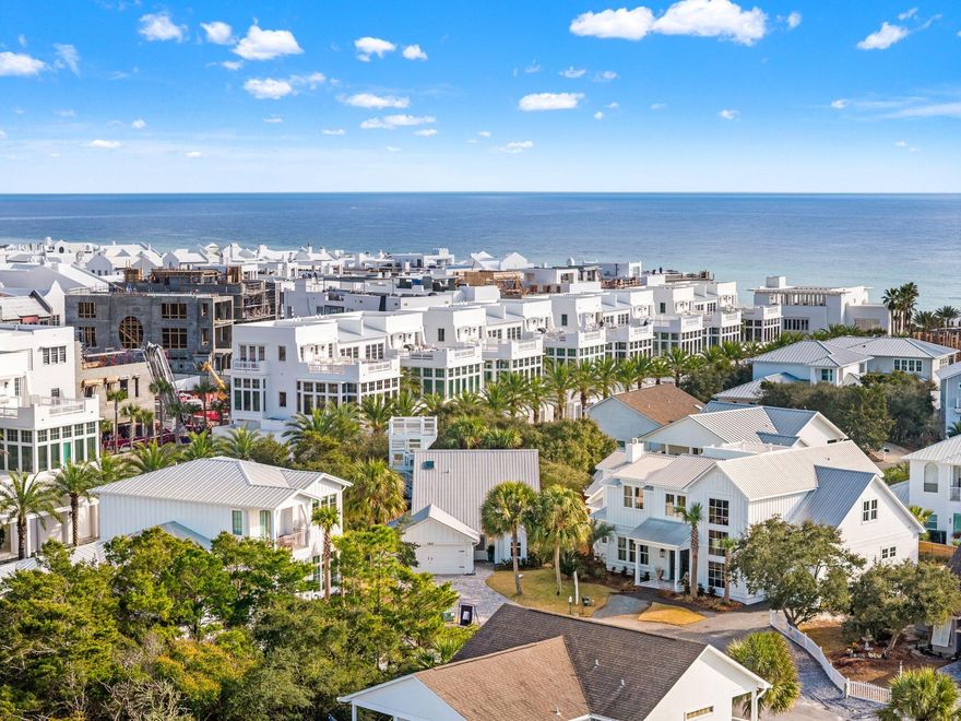 Opportunities like this are becoming increasingly rare along Scenic Highway 30A. This home is situated on an oversized lot within a south side, gated, non-rental community just steps from the Gulf w/ gulf views from the rooftop observation deck. This coastal retreat offers the privacy, space, and tranquility that many buyers seek but seldom find. The home welcomes you with classic coastal curb appeal, a metal roof, mature palms, & a spacious paver drive. The residence features vaulted ceilings, an open living & chef's kitchen w/ custom cabinetry & marble surfaces & abundant natural light throughout. Enjoy seamless indoor-outdoor living with a large screened porch overlooking the private backyard & fire-pit courtyard surrounded by mature trees. All this while being in the perfect location. Sand Cliffs is located less than a mile from Alys Beach, Camp Creek golf course and all the luxury shopping and dining along the east end of 30A. 