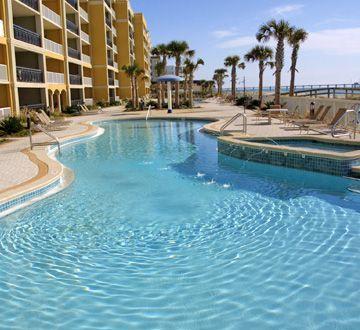 Awesome luxurious 4 bedroom 3bath east end ground floor Gulf- front unit!!! Azure, the Italian Piazza, is located on 515' of white sand beaches. It is surrounded by 2 large gulf front pools (one stays heated all year round), 2 spas and a spray park surrounded by lush tropical landscaping. Condo features 9' ceilings, crown molding, 18x18 porcelain tile, designer light fixtures, separate laundry room with full size washer & dryer, owner's closet, oversized balcony & a private exterior storage. Kitchen features granite countertops, tile backsplash, stainless steel appliances & pantry. Master bath features double vanity with granite counter tops, separate shower and 2-person whirlpool tub. A/C unit is only a couple of years old. Condo on VRBO, YTD as of 9/30 is $88,443. DON'T MISS OUT!!!