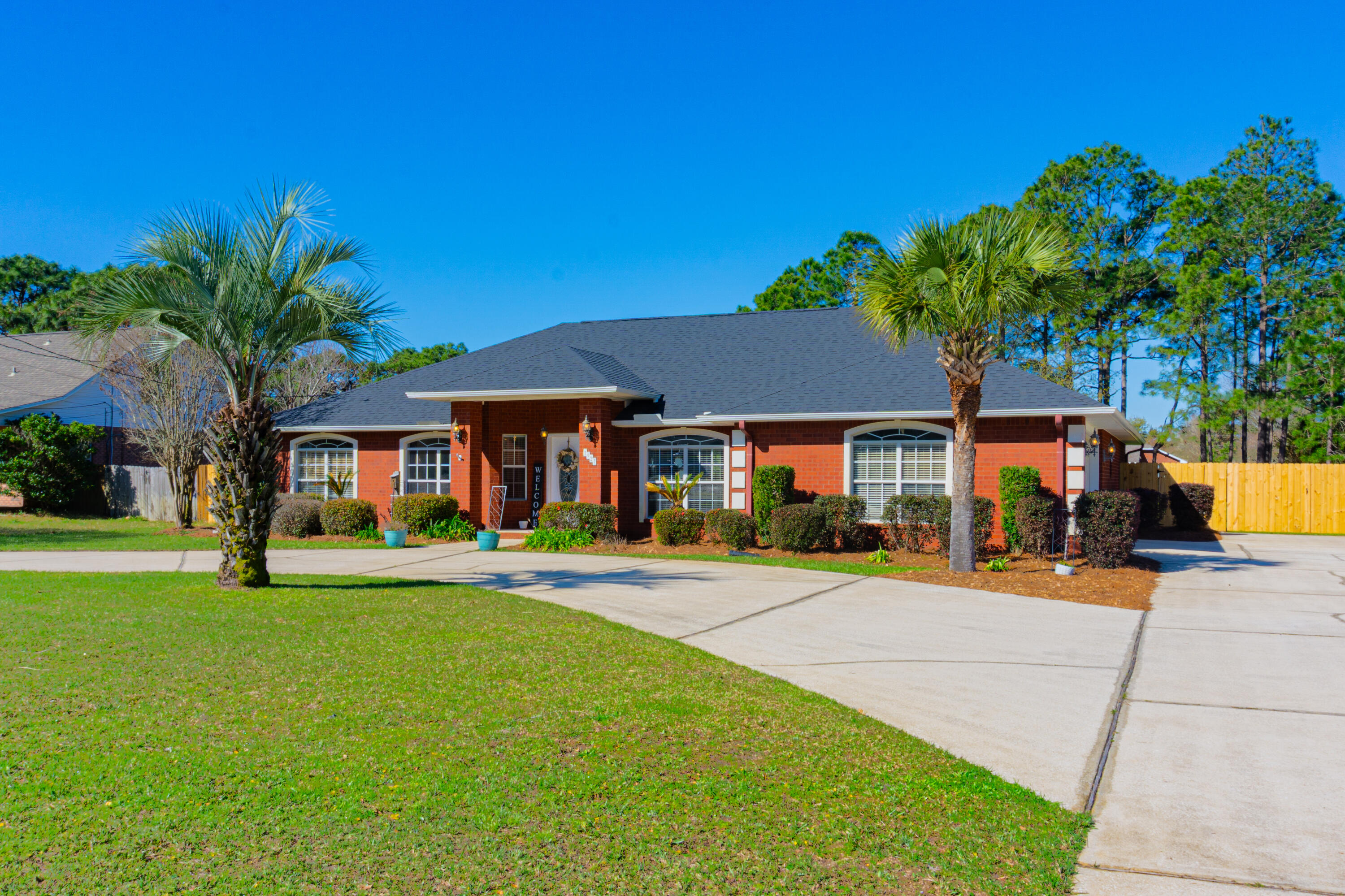 Impressive Brick Home will Wow you on First Site! Located in sought after Holley By The Sea Subdivision with all the Amenities it offers! Convenient to Hurlburt Field to the East and Pensacola NAS to the West. This Gorgeous Updated Home sits on an Oversized 1/2 acre Lot with Circle Driveway. The Side Entry Garage and Extended Driveway allows room for RV or Boat Parking behind the Double Gate. Inviting Foyer leads to Sunlit Dining Room on your right and 4th Bedroom or Office to your left. Vaulted Ceiling Family Room with Fireplace is open to the Kitchen and Breakfast Area. Split Bedrooms. Master Suite with His & Hers Walk-in Closets, Remodeled Bathroom, Tiled Shower, Tub, and Double Vanity. Fabulous Screened Porch extends your Outdoor Living! Beautiful Fenced Backyard. Room for a Pool. Holley By The Sea amenities include three pools, tennis courts, gym, beach house, pier, playground, boat launch, and so much more!
This Home is well maintained and Ready for it's New Owners!
Buyer to verify all pertinent info.
PER SELLER-
Roof 2022
HVAC 2022
Water Heater Apr 2025 Brand New!
Septic Pumped & Inspected Apr 2025
Elec - FL Power & Light
Water - Holley Navarre Water Systems
Internet/Cable - At&T Mediacom DirecTV Dish
Trash - Waste Pro or Adams Sanitation