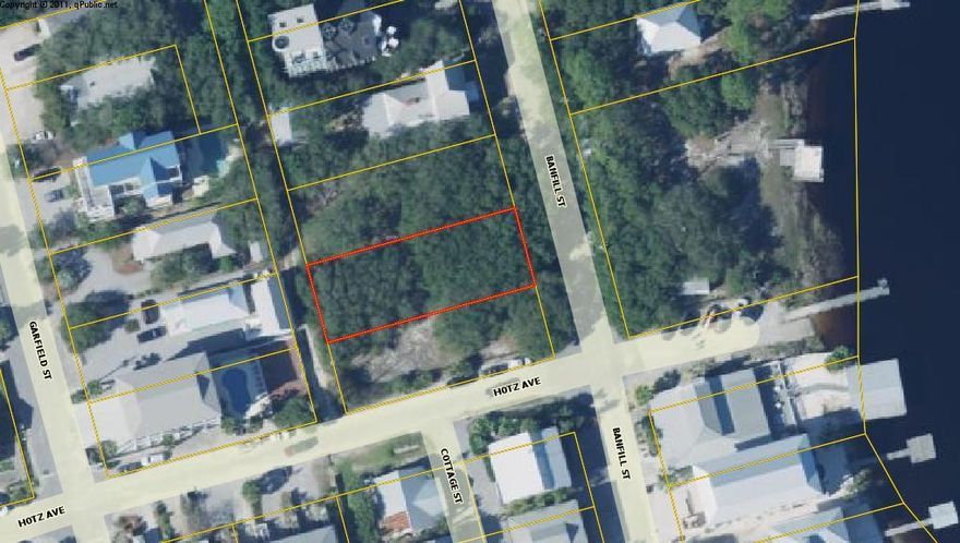 One of the few remaining opportunities to build your dream home in Grayton Beach. This property is across the street from Western Lake and a block to the beach boardwalk. Alley access and a modified rear setback will allow for construction of a large home while retaining the beautiful oaks in the front for privacy and charm.
