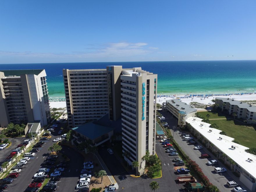 Tenth floor condo with expansive beach and water views. Annual gross rental income of $33,300. Unit was furnished and decorated in 2016 by Sugar Beach Interiors. The building lobby just underwent an extensive renovation and is warm and welcoming. SunDestin Resort features indoor and outdoor pools, splash pad for children, conference center, gift and convenience shop, fitness center, game room, whirlpool, sauna, Cabana Caf, tiki hut, BBQ/grill area, and 24/7 front desk service. Low condominium dues of $455 per month include all utilities, even electricity.