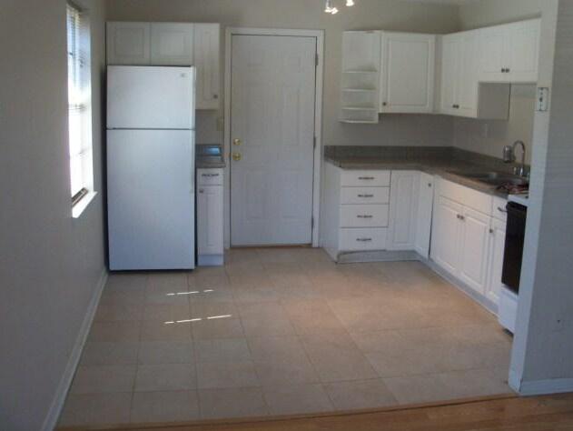 SOUTH PORT PATIO HOMES - Residential Lease