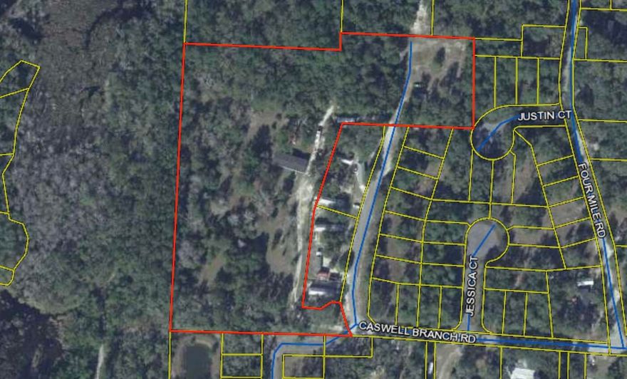 Beautiful High and Dry 6.72 acre parcel that backs up to Hammock Bay Trail. Deep water well, Several taps on the property and all tap fees paid. Property also has room to have horses, cows, chickens. ***Developers***Zoned High density residential Location, location ,location!!