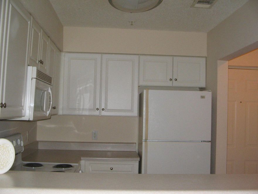 Ground floor unit features 2 bedroom with walk-in closets, 2 baths, patio with, storage closet, washer & dryer included. Condo has resort style pool, spa, suana, business center, 24 hour fitness and picnic areas. Buyer to verify sq. ft and dimensions.