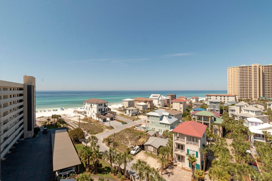 Gorgeous views from this 2BR/2BA, 956SF, top floor unit. As you enter the unit you are greeted by light & modern dcor. The living space features a vaulted ceiling with additional windows, balcony access, and amazing coastline views. The kitchen has stainless appliances, plenty of cabinet and countertop space, & a large breakfast bar. The large master suite features balcony access, coastline views, dressing area, and private bath. There is also an additional bedroom with private access to the full hallway bath. Other features include a hallway laundry closet with new stackable washer & dryer. This unit is being sold furnished & rental ready. Mainsail amenities include 24hr security, 2 large pools, tennis courts, and 700FT of deeded beach. See you at the Beach!