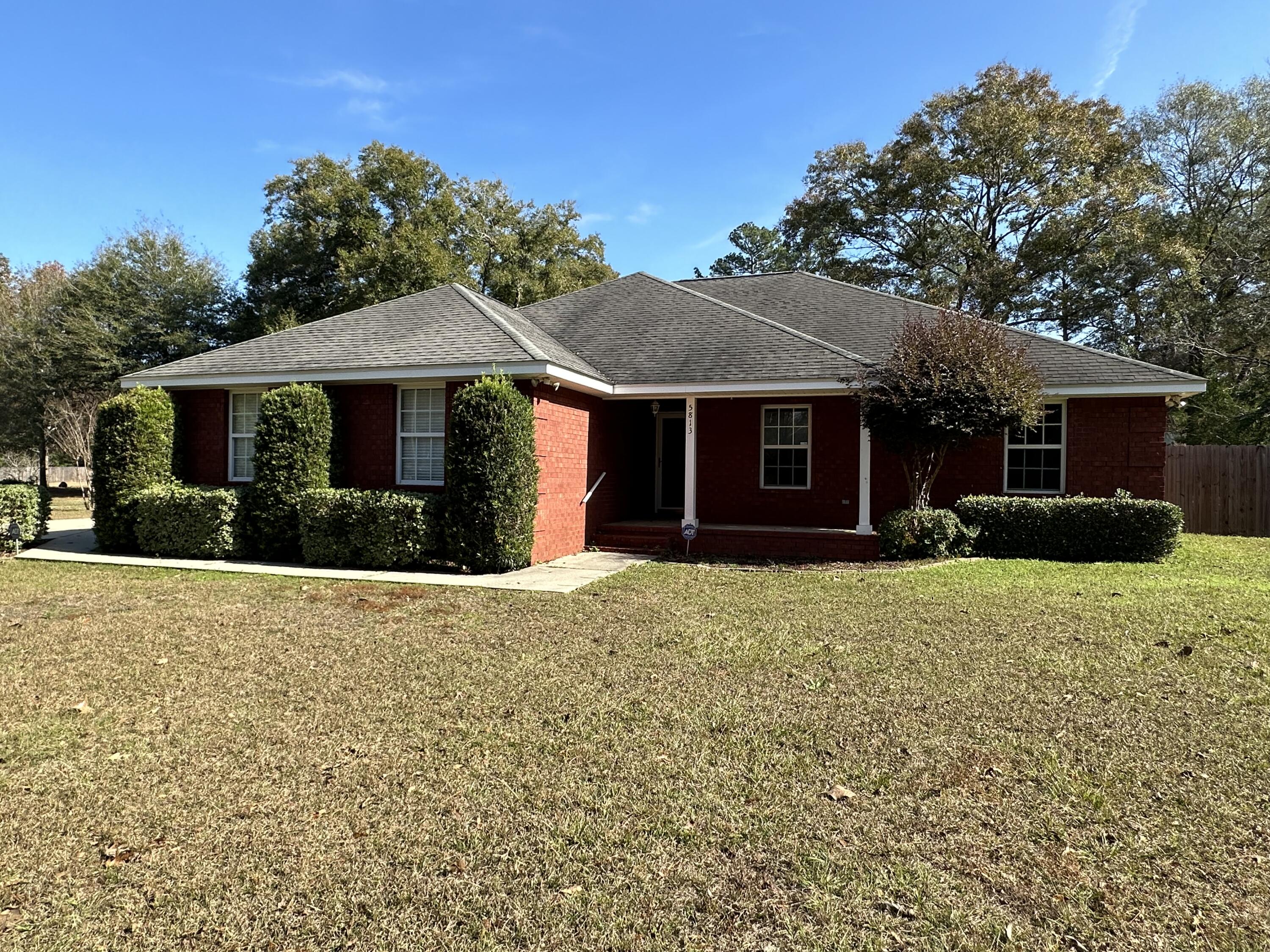 All brick half acre home short walking distance to Davidson Middle School Short drive to Crestview High School. Easy access to hwy 85.  Short drive to local shopping centers, grocery stores, beaches and military bases.This gorgeous home features Laminate wood flooring, tile and carpet. Corner fireplace in living room. Back porch is under roof.Tray ceilings with crown molding.A large Master bedroom and luxurious Master bathroom.Fenced in back yard. Listing Agent is Owner.No pets allowed.