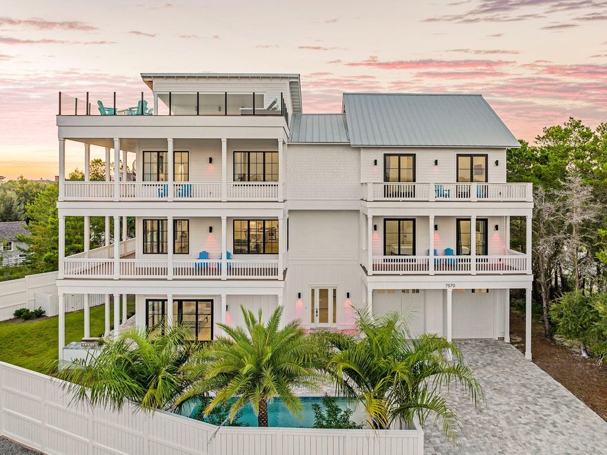 Distinguished by breathtaking Gulf & Coastal Dune Lake views, 'Camp Creek Villa' is a luxurious coastal retreat featuring 8 bedrooms and nine bathrooms, accommodating up to twenty-four guests, located by Camp Creek Lake on 30A. Enjoy the beauty of the charming courtyard, complete with a private pool and covered patio. With beach access just a short stroll away and The Big Chill on 30A less than a mile from your doorstep, this is the perfect vacation retreat. Illustrating the beauty of the Gulf Coast, 'Camp Creek Villa' perfectly combines indoor and outdoor living with a spacious three-story layout and expansive backyard. Upon entering, the first-floor game room complete with a ping pong table, entertainment area & wet bar evokes a playful competitive spirit. Cheer on your favorite team on the oversized couch while sipping & snacking. Down the hall is a bunk room with three twin-over-twin beds perfect for the kids to game out or scroll. A shared bathroom and laundry room are also located on the first floor. The sliding glass doors provide direct access to the lush turf, private pool, outdoor shower, and natural gas grilling station. Unwind on the loungers or daybed while listening to the cascading waterfall in the pool.

Step into luxury with an in-home elevator that leads to the second-floor great room, complete with a wall of windows that frame nearly 360-degree views of the Gulf and a rare Coastal Dune Lake. The coffered ceilings, shiplap walls, and wood floors add a touch of elegance as loved ones relax on the two matching sofas in the living area. Guests can assist with meal prep at the five-stool breakfast bar and gather around the eight-seat dining table for a home-cooked meal or catered dining experience. The dining area provides access to a covered balcony, perfect for sunrises with coffee or a smoothie. With side-by-side commercial refrigerators and a four-burner stove, the gourmet kitchen is fully equipped for the talented home chef.

Before retiring for the evening to the two guest bedrooms off the great room, continue your favorite book in the reading nook near the stairs. The third floor was thoughtfully designed for the seasoned traveler consisting of an outdoor balcony with porch swing, as well as a bonus room, complete with a TV, wet bar, couch, armchairs, and game table. The primary bedroom is a five-star resort within itself with a private balcony, king size bed and a spa-like ensuite bathroom with double vanities and a soaking tub enclosed in a walk-in shower. Also on the third floor is another bunk room with two twin-over-twin beds and shared bathrooms. Two additional guest bedrooms are both equipped with queen beds and ensuite bathrooms, one only accessible through the bunk room. This floor also has a laundry room with a full-size washer and dryer. Above the third floor is an amazing viewing deck. 'Camp Creek Villa' offers a quintessential beachfront experience with the finest luxury amenities. With on-site parking for six vehicles, including two in the garage, this is ideal for exploring the other scenic 30A communities.


RESTAURANTS NEARBY
" The Big Chill - Variety of Restaurants/Family Friendly
" Pizza By The Sea (Casual)
" La Co Latin Coastal (Casual)
" Reel 'Em In (Seafood Market)
" Amavida (Coffee)
" The Citizen (Fine Dining)
" Old Florida Fish House (Casual)
" Cowgirl Kitchen (Casual)
" La Crema (Tapas)
" Pescado (Fine Dining/No Kids)
" Paradise (Fine Dining)
" Summer Kitchen (Casual)
" Charlie's Cafe (Coffee & Donuts)
" Edwards (Fine Dining)
" Seacrest Sundries (Grocery/Grab & Go)

HOME HIGHLIGHTS:
- Gulf & Coastal Dune Lake views throughout the home
- Private pool 
- Elevator
- Rooftop Terrace
- 2 Game Rooms
- 6 Adult Bikes Included
- Two 6 Seater Golf Carts Included
- Beach Accesses: Gulf Lakes Public Beach Access & Deer Lake State Park


SLEEPING ARRANGEMENTS (Sleeps 24):

FIRST FLOOR:
- Guest Bedroom 1: Three Twin over-Twin Bunk Beds (sleeps 6) Shared Hallway Bathroom with Single Vanity & Shower/Tub Combo

SECOND FLOOR:
- Guest Bedroom 2: Queen Bed (sleeps 2) & Ensuite Bathroom with Single Vanity & Shower/Tub Combo
- Guest Bedroom 3: King Bed (sleeps 2) & Ensuite Bathroom with Double Vanity & Shower
- Guest Bedroom 4: Two Twin over Twin Bunks with Shared Bathroom with Single Vanity & Tub/Shower Combo

THIRD FLOOR:
- Primary Bedroom 5: King Bed (sleeps 2) & Ensuite Bathroom with Double Vanities & Soaking Tub Enclosed in Walk in Shower
- Guest Bedroom 6: King Bed (sleeps 2) & Ensuite Bathroom with Single Vanity & Shower/Tub Combo
- Guest Bedroom 7: Queen Bed (sleeps 2) & Ensuite Bathroom with Single Vanity & Shower
- Guest Room 8: Bunk Room with Two Twin Over Twin Beds with Shared Bathroom with Double Vanities and Tub/Shower Combo