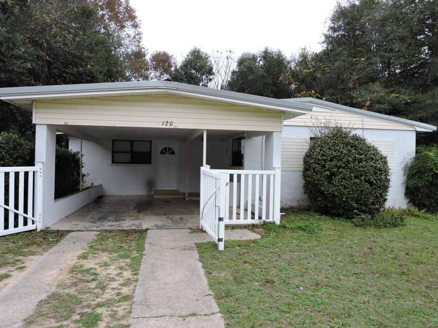 Available Now! Great deal on 4/2 in mid-town! Metal roof, most all windows replaced, laminate flooring in all rooms but one bedroom, baths & kitchen (tile). Walk in shower in master bath. 17x20 carport & 8x15 covered back porch. Fenced yard w/small storage building. Call today to set your appt.