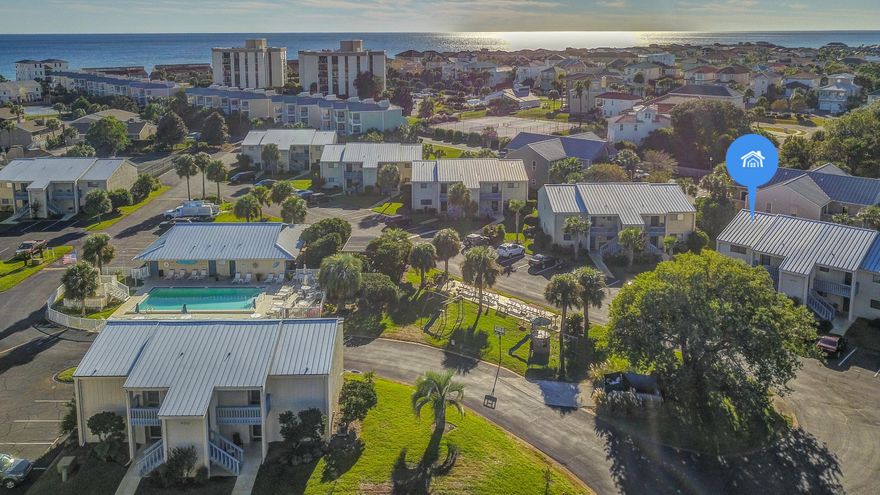 Check out this 2 bedroom 2 bath unit at Chateau La Mer II located just steps from the beautiful white sandy beach and emerald water of the Gulf of Mexico. Great investment property, second home, or primary home. This 12 acre community offers a pool, tennis courts, playground, clubhouse, and also 200 ft of deeded beach next to Captain Dave's Restaurant. 2018 Gross rental income over 20K YTD with owner usage. A/C was replaced approximately 2 years ago. This 2nd floor unit has Cathedral ceiling with the popcorn removed. Bring your flip flops and come check out this unit before it's gone.