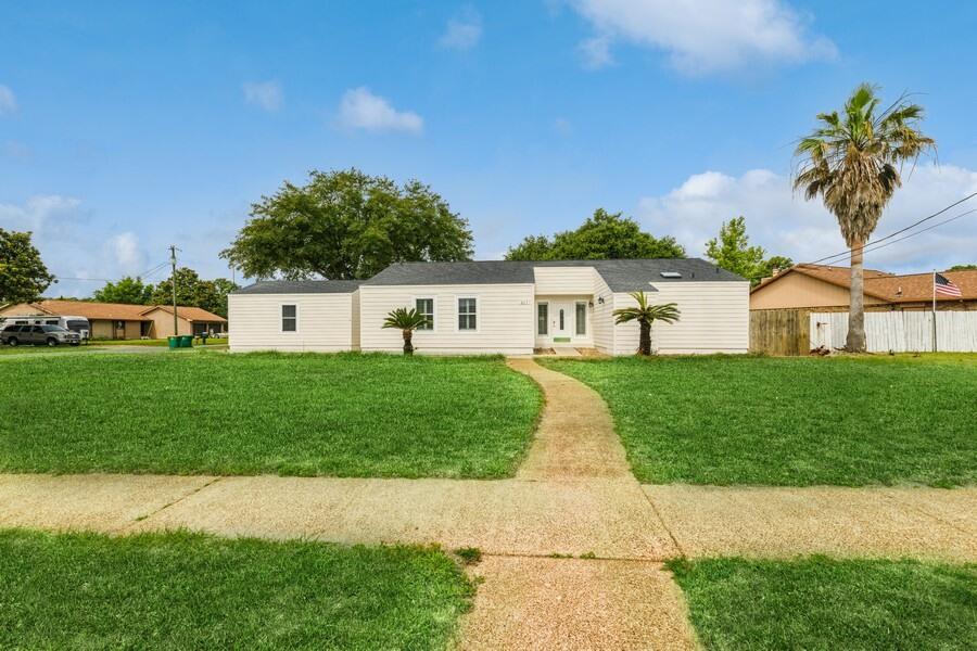 Check out this beautiful home situated on a large corner lot. Neighborhood features sidewalks and waterview across the street from your front door. Come home and relax in your fenced in back yard under the pergola. The exterior of your home is hardie board making it easy to maintain and was just painted less than a month ago! Step inside your home and enjoy the the sunken living room which boasts 13ft ceilings. Interior also offers Pergo flooring throughout, stone/solid surfaces, plantation shutters on windows, beautiful stone fireplace, floor to ceiling tile in master bathroom and so much more to list. This unique property is a must see!