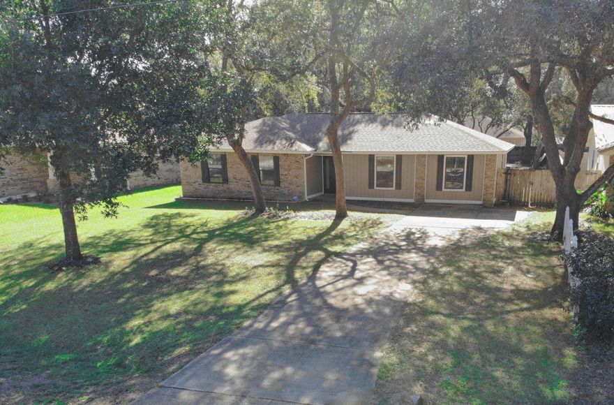 LOCATION! LOCATION! LOCATION! Feel the breeze of the Rocky Bayou Bay from your own front door. With only minutes from shopping centers and A+ schools. This HIGHLY desired location also provides a quick commute to local military establishments like Eglin, AFB and 7th Special Forces. This stunning home comes with a Jacuzzi in the back yard with a privacy fence and plenty of room to add a pool. Comfortable living space with a converted garage that would make an amazing media room. This home is move in ready and could be your dream home. Schedule a showing now! This one won't last long!