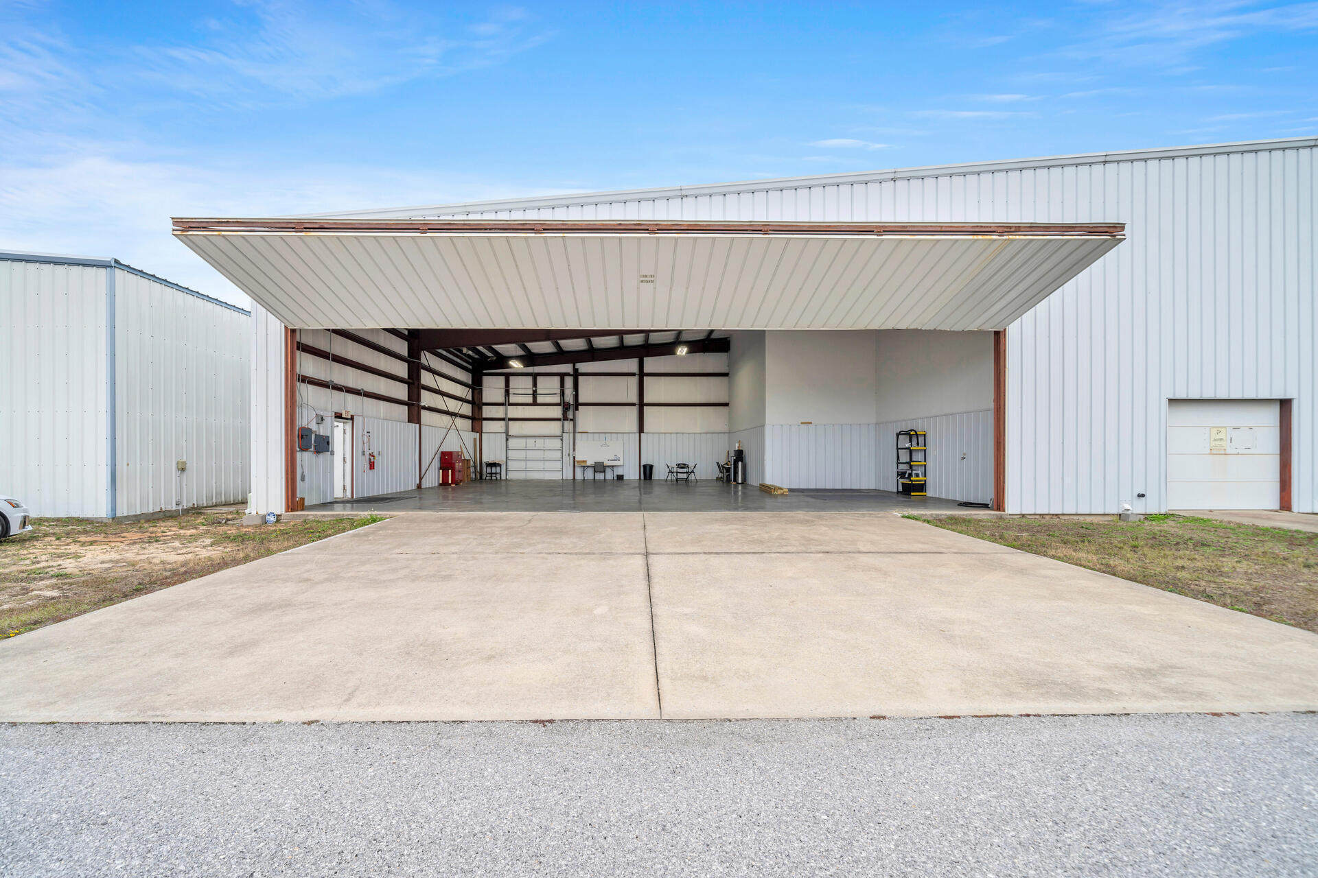 The Destin Executive Airport (DTS), located in the heart of Destin, Florida, rarely offers private leaseholder interest in hangar opportunities. We are now offering one of the most price-effective airplane hangars at DTS. The related ground lease matures in approximately (16)-years, on July 11, 2040. The conditioned metal building contains manual swing doors and is oriented at a prime end-cap location, adjacent to the taxiway, and convenient to the FBO to utilize the host of supporting aviation services. Please inquire for further details and to schedule a private showing. Hangar Depth: 50' Height in Center of Hangar: 15' Swing-Door Opening Width: 43' Tail Clearance: 14'