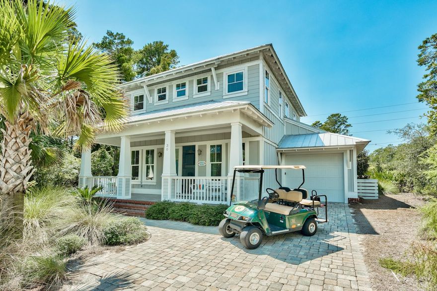 This amazing custom built vacation home in Lakeside at Blue Mountain has it all with four bedrooms plus an additional bunk room (5th bedroom), three and a half baths, and garage - plus a golf cart to get to the beach - and is being sold fully furnished. A local rental company projects $64,000 in yearly gross rental income. A wide, front porch greets you as you walk up to the home. Inside the open living room, dining area and kitchen are great for entertaining and get togethers. The first of two master suites is on the first floor, along with a screened in porch on the back of the house. Upstairs you will find another master suite, two additional bedrooms and a bunk room for plenty of space for family or vacationers. The home has two AC units, as well as two owner's close