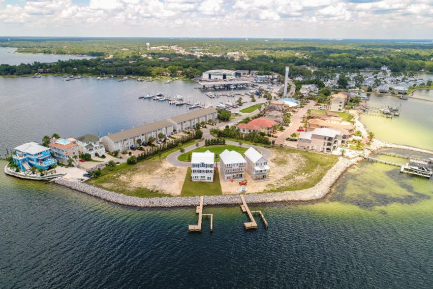 The Pointe is a brand new, deep waterfront neighborhood in the heart of Fort Walton Beach built exclusively for nine homes. This 4 bedroom, 3.5 bathroom property would be a wonderful permanent residence or vacation home. The views of Choctawatchee Bay from private porches/balconies on each of three floors are endless!The first floor is equipped with a two car garage, extra storage for all of your water toys, a guest bedroom with full bath, and a cabana room for entertaining directly off the water. Both the guest bedroom and cabana room maintain large windows allowing for natural lighting and a panoramic view of the bay.The second floor is built for entertaining! The open concept kitchen to great room flows directly out to the balcony. The kitchen...