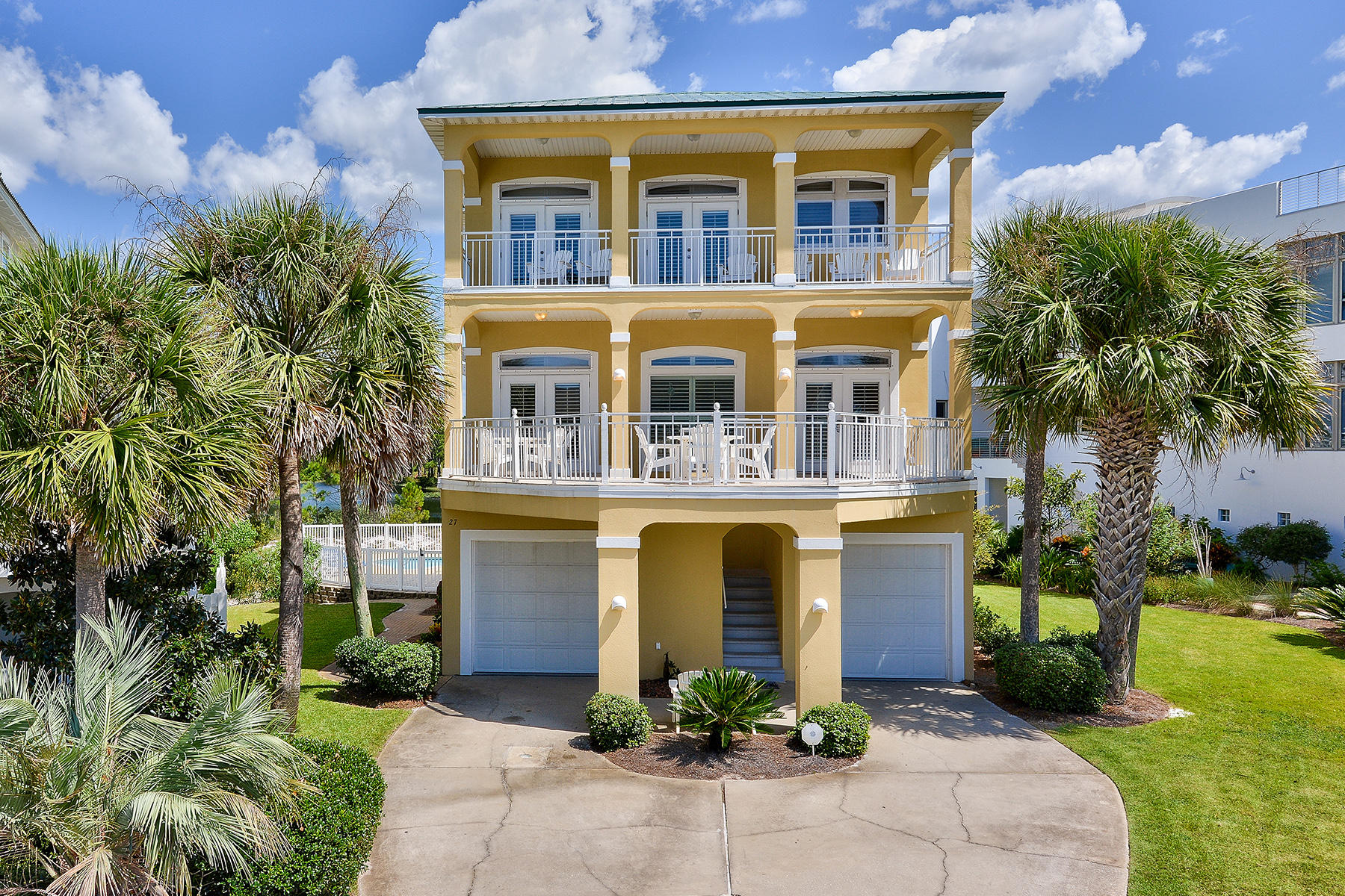This amazing eight-bedroom, five-bathroom home situated on a lake in Seagrove Beach, FL, is a rental machine and a prime vacation getaway along Scenic 30A with spectacular Gulf views. The ''Yellow Parrot'' did more than $170,000 in gross rentals in 2015 and over $168,000 in 2014. As of March 1, 2016, the home already has over $150,000 booked for the 2016 rental year. This wonderful beach home includes a heated pool and spa, two-car garage and Gulf views from the large second-floor deck and the master bedroom's private balcony on the third floor. When you enter the first floor, there are two guest rooms - one with a king bed and the other with two queens. There is a full bathroom with double vanities and Jauczzi tub/shower, a large owner's closet, and two oversized separate storage
