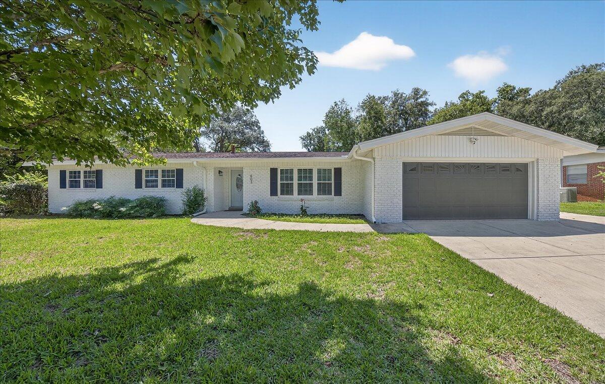 Don't miss this turn key 5 bedroom/3.5 bath beauty! This large, sprawling, ranch home is perfect for anyone looking for some extra space! The beautiful, large, crape myrtle lined corner lot also features a freshly re-lined pool, covered patio, and lots of space to enjoy the beautiful FL weather! The interior features 5 bedrooms, with the option of 2 separate primary suites; perfect for multi generational living, a family looking for more space, or the potential for an income producing rental room! The interior has been completely renovated. Brand new kitchen cabinets and countertops, new LVP flooring throughout, newly updated bathrooms, and of course fresh paint throughout.... this house is move in ready! Major systems ages: HVAC 2023, Hot water heater 2022, Roof 2017. Buyer to Verify all pertinent information.