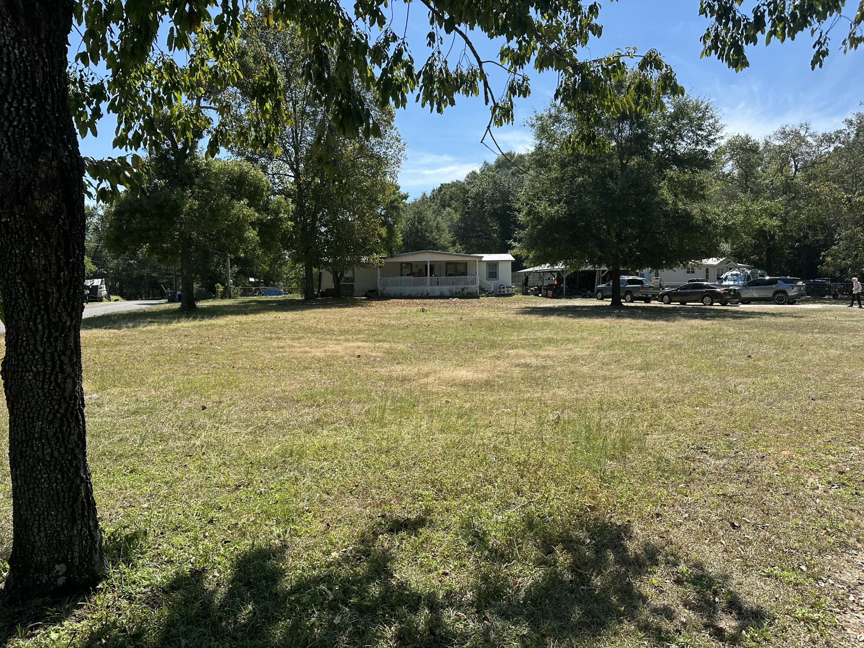 3 Bedroom Mobile Home on Spacious Corner Lot - Great Investment Opportunity!Located on a generous .66-acre corner lot, this 3 bedroom, 1.5 bathroom mobile home offers endless possibilities for the right buyer. Built in 1980, the home needs some TLC but has solid potential as a starter home, rental property, or renovation project.The property features a two-car carport for covered parking and a block building that can be used as extra storage or converted into a separate living space or workshop, great for guests or hobbyists.Plenty of outdoor space gives you room to expand, garden, or simply enjoy country-style living with the convenience of town nearby.Cash loans only. Sold as-is! Bring your vision and make it your own!