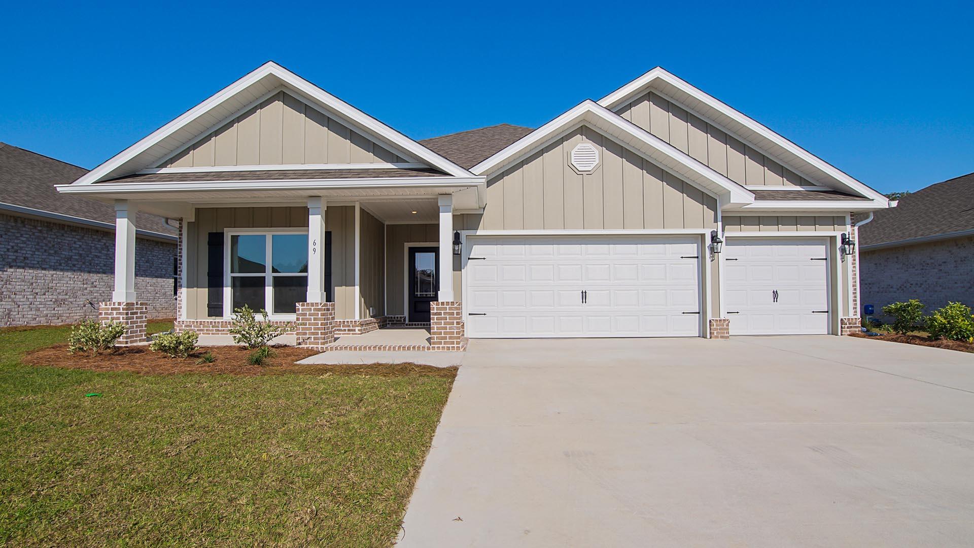 Welcome to the 69 Great Horned Owl Court, a new home located at Owl's Head Farms, in Freeport, Florida. This home is nestled in a cul-de-sac and is under construction. Step inside to a welcoming and open layout designed for comfortable living. The kitchen, complete with quartz countertops, Whirlpool stainless steel appliances, undermount single basin sink with a dedicated water filter faucet and a functional island, opens directly to the dining area and living room, creating a seamless space for entertaining and relaxation. The high 9' ceilings and additional tray ceilings in the living and primary bedroom create boosts the luxurious feel in this home. The owner's suite, tucked away at the back of the home, features a private bathroom with a walk-in shower and double vanity.