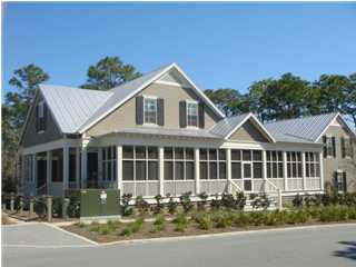 This charming WaterColor home is situated on a corner lot in the Oak Grove section of Phase III and is located just steps away from the Pool and Park area. This home boast an amazing screened-in porch area spanning over 1,000 sq. ft. bringing the overall ''under-roof'' square footage to 4,235 sq. ft. This ''Cottage E2'' floor plan has 4 full bedrooms with an additional bunk room giving you enough room to sleep at least 12 comfortably. There is also a 2-car garage with seperate apartment above that is connected to the house. Entering through the front door you are greeted with a wonderful living area with doors leading out to the expansive screened-in porch allowing the perfect space for relaxing and/or entertaining. The Master bedroom is located on the 1st level with the 2