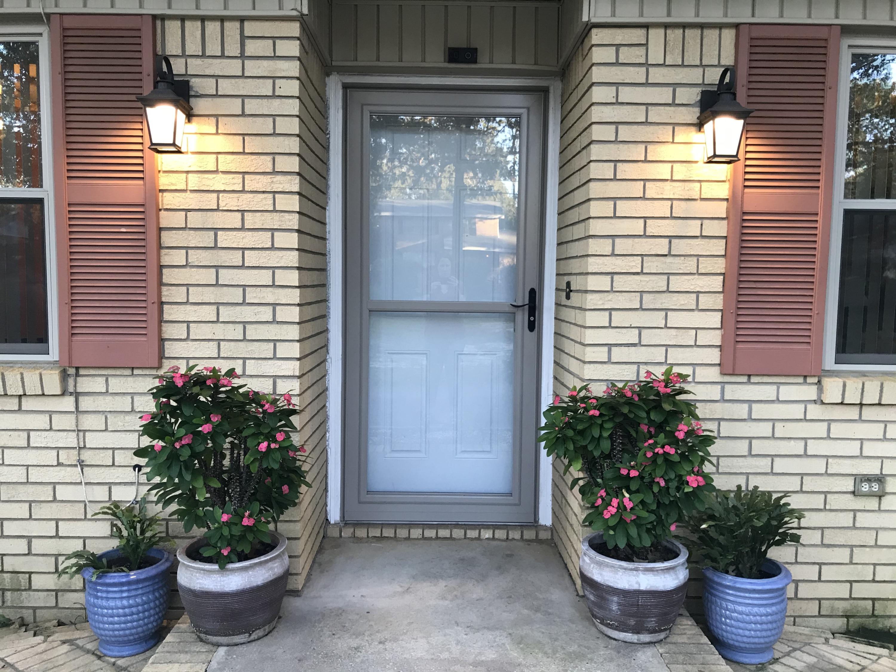 Located in a coveted and established neighborhood right in the center of the city--this home is updated and ready for you! Updates included: roof, A/C, windows, doors, and paint. Enjoy a beautiful kitchen that opens up into the large family room with an adjoining dining room and living room. Outside you'll find a large circle driveway with access along the side to additional parking in the back. And with over half an acre, this lot boasts a garden with raised beds, kumquat trees, date trees, apple tree, pear tree, chestnut trees, pomegranate tree, and persimmon trees. Along with the storage shed outside, there's tons of extra storage space inside with two closets in the family room, a closet and pantry in the kitchen, a huge 11x12 finished laundry room, and an even bigger bonus room with space for an office, craft/school room, or home gym! Enjoy a whole house water softener system and the peace of mind that there has not been any smoking or pets in the home. Close to downtown, bases, and beaches--come and see today!