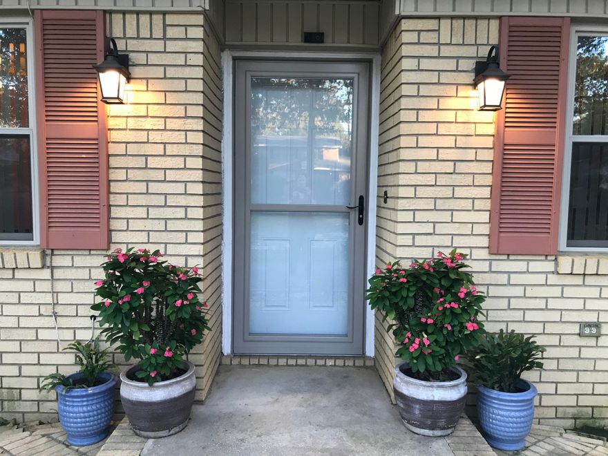 Located in a coveted and established neighborhood right in the center of the city--this home is updated and ready for you! Updates included: roof,  A/C, windows, doors, and paint. Enjoy a beautiful kitchen that opens up into the large family room with an adjoining dining room and living room. Outside you'll find a large circle driveway with access along the side to additional parking in the back. And with over half an acre, this lot boasts a garden with raised beds, kumquat trees, date trees, apple tree, pear tree, chestnut trees, pomegranate tree, and persimmon trees. Along with the storage shed outside, there's tons of extra storage space inside with two closets in the family room, a closet and pantry in the kitchen, a huge 11x12 finished laundry room, and an even bigger bonus room with space for an office, craft/school room, or home gym! Enjoy a whole house water softener system and the peace of mind that there has not been any smoking or pets in the home. Close to downtown, bases, and beaches--come and see today!