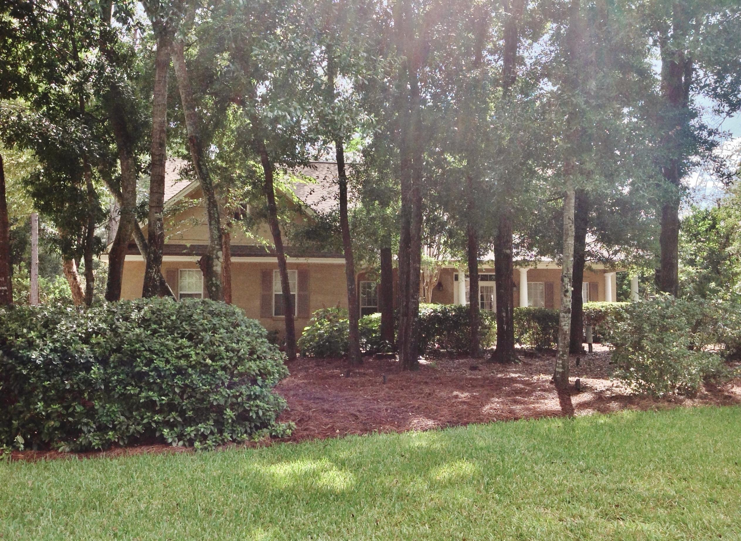 REDUCED FOR IMMEDIATE SALE!5 bedrooms /3 full baths, Formal Dining Room, Large Living Room, Library/Den with built in bookshelves and Gas FP, Laundry Room with cabinets and long counter top for folding. Master bedroom is down, with his and hers closets.* Her closet is Huge. Slate shower and separate soaking tub in master bath, with large linen closet, private water closet and granite counter top & double vanities. Guest bedroom downstairs on opposite side of home & Guest bath, perfect for mother-in-law, or guests. Floor to ceiling windows & Crown molding. Entire 1st floor is acid stained, scored concrete, similar to the museum floors in Europe. Real Cherry hardwood Floors upstairs. Huge Media Room, 3 bedrooms and & full bath. On large, level .41 acre lot, across from gated park.