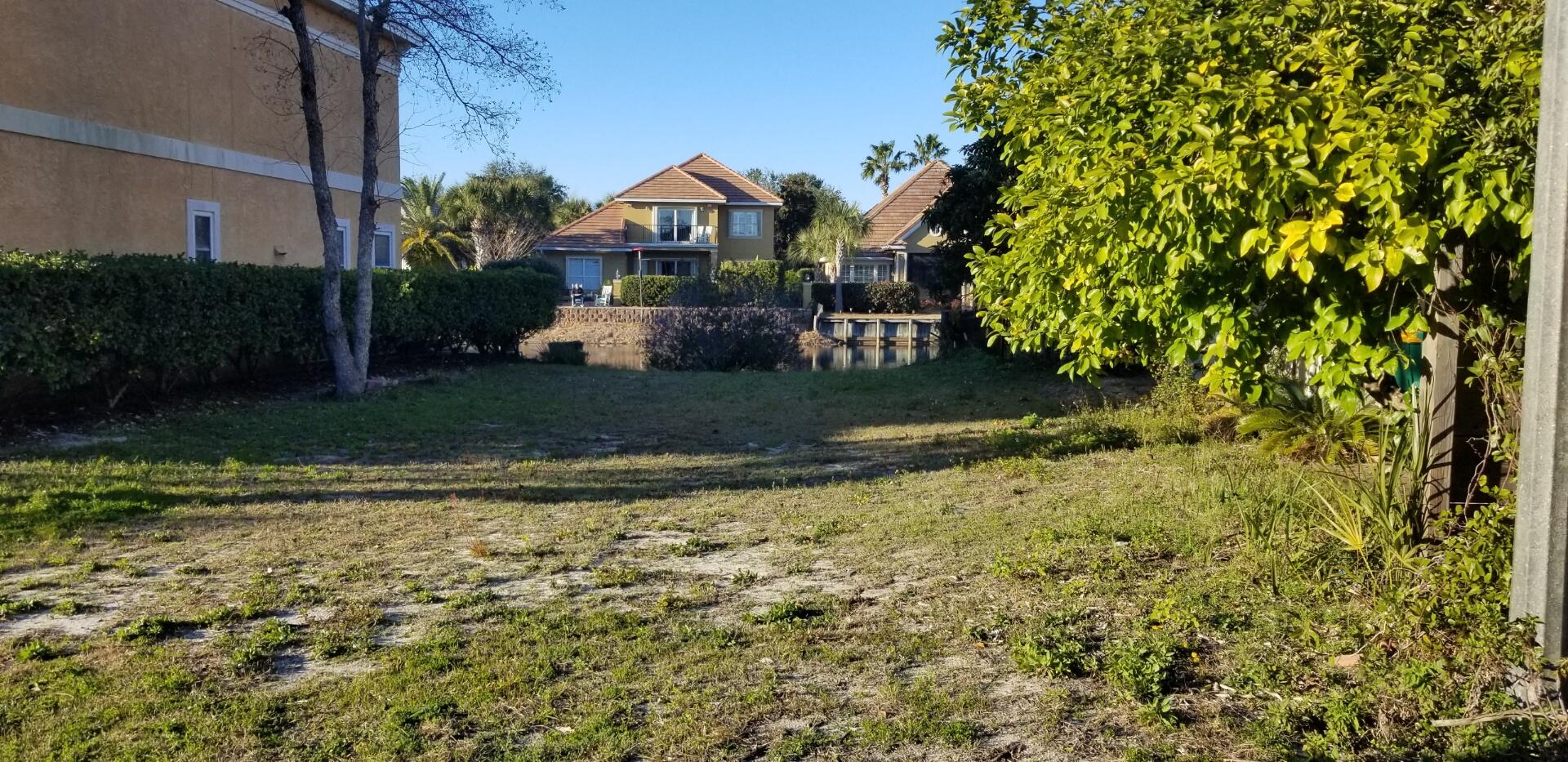 Rare opportunity to own a waterfront lot in Calusa Bay, an exclusive gated community in the heart of Destin. This lot is one of the few remaining undeveloped properties in the neighborhood--and one of the few directly on a neighborhood pond. Lot is located on a dead-end street near the cul-de-sac, offering added privacy. Calusa Bay features a community pool, and a well-maintained, low-density setting. Short-term rentals are not permitted, making it ideal for a full-time residence or second home. Located adjacent to Regatta Bay Golf Course and just minutes from Destin Commons, Legendary Marina, beaches, shopping, and dining. HOA dues are $229 per quarter. A prime location to build your custom coastal home. Don't wait, schedule a preview of the property before it's gone!