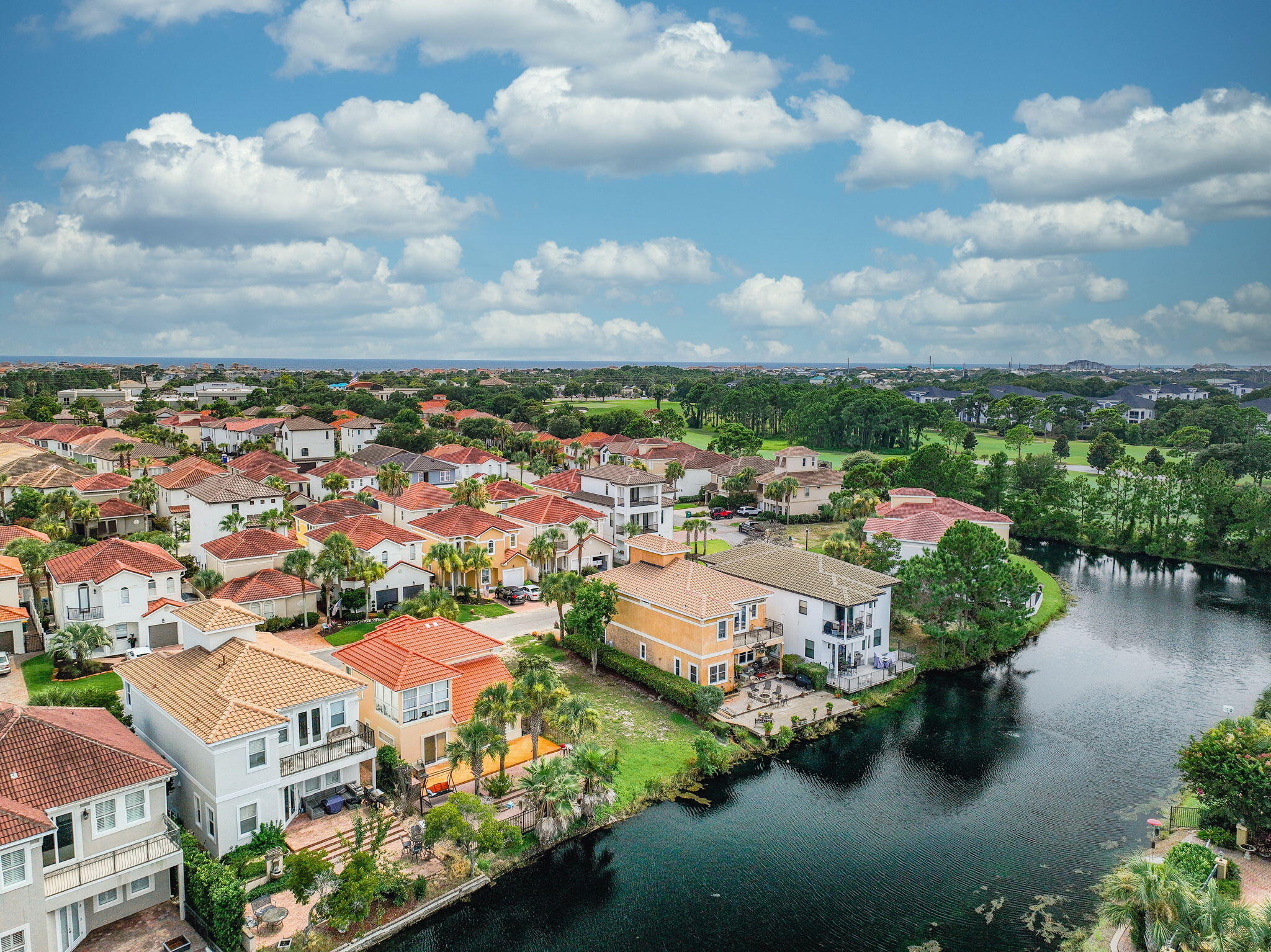 Rare opportunity to own a waterfront lot in Calusa Bay, an exclusive gated community in the heart of Destin. This lot is one of the few remaining undeveloped properties in the neighborhood--and one of the few directly on a neighborhood pond. Lot is located on a dead-end street near the cul-de-sac, offering added privacy. Calusa Bay features a community pool, and a well-maintained, low-density setting. Short-term rentals are not permitted, making it ideal for a full-time residence or second home. Located adjacent to Regatta Bay Golf Course and just minutes from Destin Commons, Legendary Marina, beaches, shopping, and dining. HOA dues are $229 per quarter. A prime location to build your custom coastal home. Don't wait, schedule a preview of the property before it's gone!