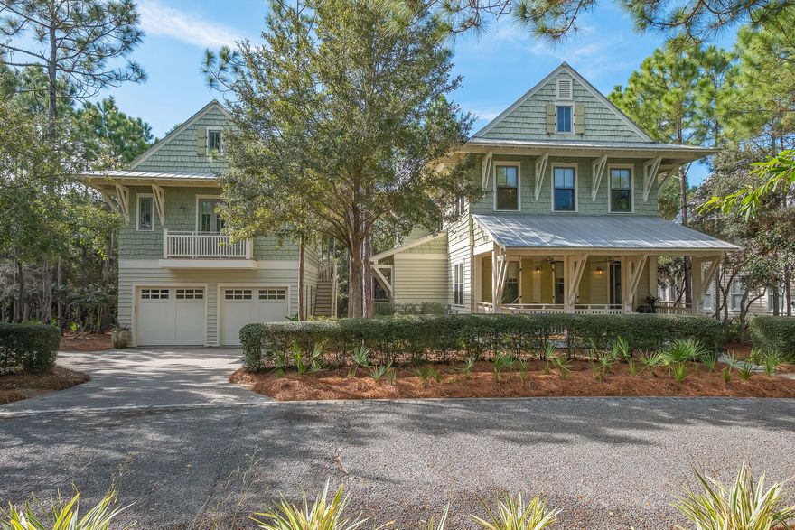 Privately situated at the end of a beautiful tree lined cul-de-sac, sits the serene, coastal Watercolor retreat of 132 Sandy Creek Drive. The main home offers 3,174 sqft, 4-bedrooms, 4 baths with detached two car garage and one-bedroom carriage house.Step across the rocking chair front porch into the welcoming foyer where a first-floor junior suite await. The expansive great room is surrounded by windows, bringing in natural light, providing the perfect backdrop for family gatherings or entertainment with generous seating surrounding the gas fireplace. The adjacent custom wet bar and wine refrigerator compliment the chef's kitchen which is anchored by the oversized center island with flawless granite countertops.