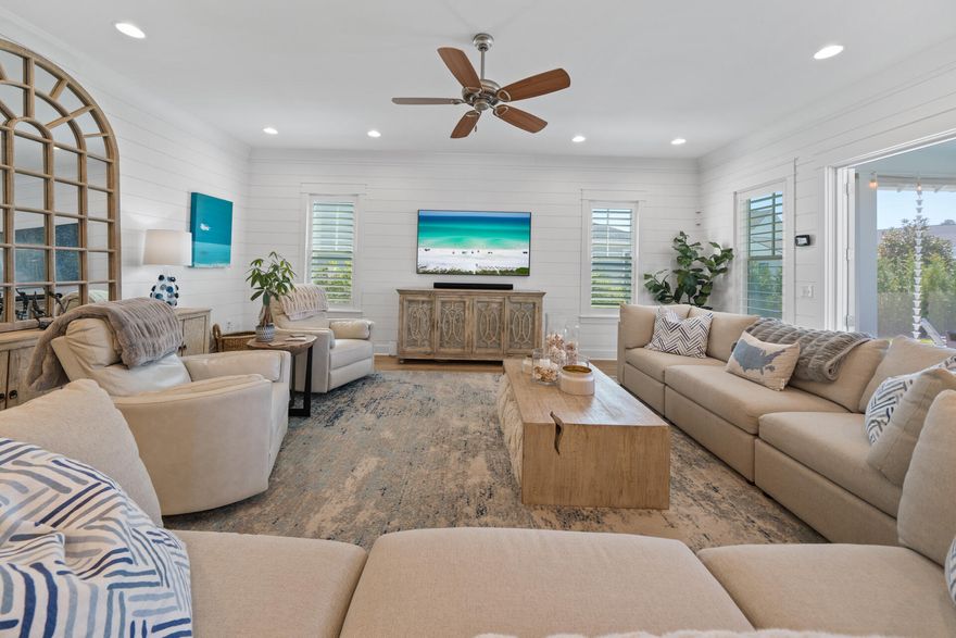 Are you ready to start living your ultimate coastal lifestyle in one of south Walton's hottest neighborhoods? Welcome home to 70 Sidecamp Road located in the desirable, amenity-rich community of Watersound Origins! Meticulously crafted coastal estate, boasts a modern design, featuring four spacious bedrooms and 3.5 full baths thoughtfully curated over 2700 square feet. Built in 2021 by Huff Homes, the Ficus plan is one of the most popular featuring 10-foot ceilings, elegant hardwood floors and coastal shiplap accents throughout. Culinary enthusiasts will fall in love with the chef's kitchen - a true entertainer's dream - with full overlay and glass cabinetry to the ceiling, premium Subzero refrigerator and Wolf appliances, a spacious walk-in pantry and quartz counters
