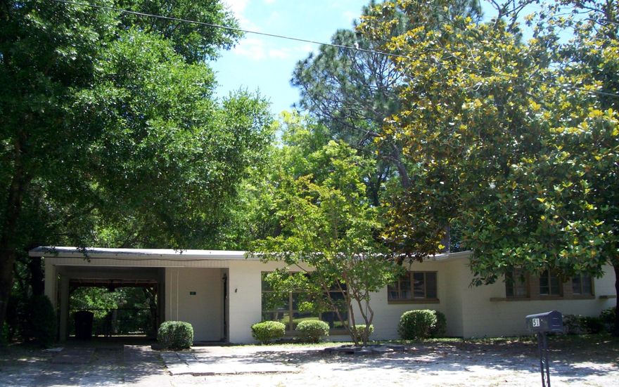 Short Sale -VERY CLOSE TO APPROVAL! This three bedroom two bath home with one car carport is move in ready. New roof 2014, updated kitchen, new outside condenser, new exterior paint, wired for direct TV in living room and two bedrooms. Seller has enclosed exterior entrance to washer/dryer and storage rooms. Home has tile floors through out except the bedrooms. House backs up to Ferry Park and is in walking distance to Elliott Point Elementary school. Seller added pull out drawers in kitchen. HOME IS BEING SOLD AS IS!!!!!