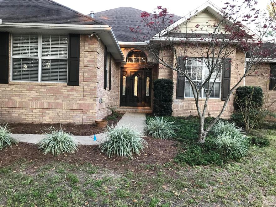 Beautiful all brick home with an open floor plan in the Shoal River Country Club.Fresh paint,new fixtures, new vinyl plank flooring. Enter into the tiled Foyer with 11 ft ceiling, that opens to the Living Room, complete with gas log heatilator fireplace, French doors opening to the Porch, and 11 ft ceilings. Adjoining Dining Room, also with 11 ft ceiling, has a lighted alcove for your precious china! An Oversized Powder Room is conveniently located just off the Foyer. Bay windowed Family Room, with a built-in desk, adjoins the tiled Breakfast Nook, LOTS of cabinets! (Owner will provide a refrigerator, if needed.) Master Bedroom Suite has a bay window, trayed ceiling, and large walk-in closet. Separate His & Hers cultured marble vanities. cultured marble whirlpool garden tub, and large separate shower. Small pet only - 10 lbs. or less - with owner approval - a pet fee and a pet deposit.