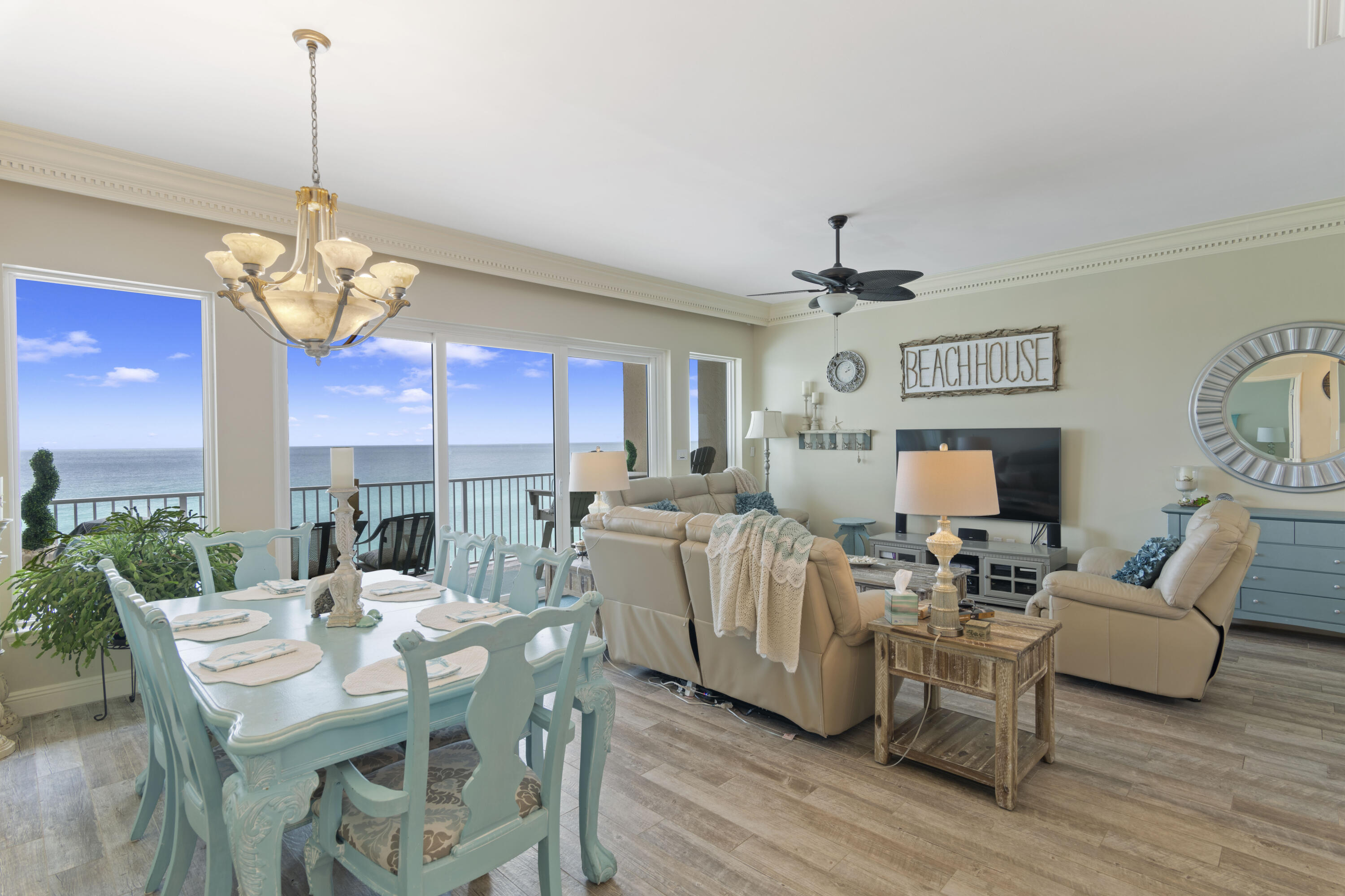 If peaceful and private Gulf-front living is what you are searching for than look no further than Compass Rose!  Compass Rose is situated along the pristine coastline of the Gulf of Mexico offering breathtaking views of the turquoise waters and sugar white beaches.  You can start every morning enjoying your favorite morning brew while the sun rises or finish off your day with a fabulous sunset from the 50' long balcony.  Now that's living!  This 2 bedroom, 2 bath Gulf-front penthouse level unit offers a 2-car tandem park garage.  The gorgeous Gulf views can be viewed from the living/dining/kitchen area and both bedrooms!  The open concept floor plan features a built-in wet bar complete with a beverage cooler and ice maker...perfect for entertaining.