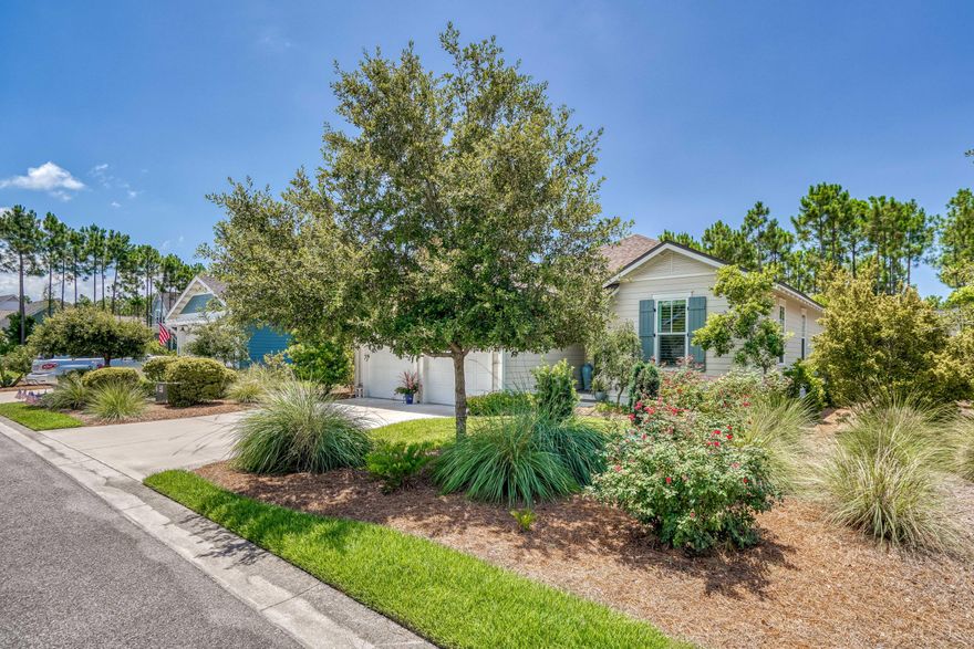 Just reduced $16,000. Cozy Florida Cottage with 3 bedrooms and 2 bathrooms and a plethora of upgrades. Featuring an open and airy floor plan with plenty of windows and natural light in all the rooms, this home offers Hardwood floors in all the living areas, Quartz counter top in kitchen and bathrooms, Plantation shutters, Culligan water system and more. The Kitchen offers plenty of cabinets for storage, stainless steel appliances and walk-in pantry. The Master bathroom offers travertine floors and shower with rimless glass, recessed lighting and a large walk-in closet. With all nearby construction finished and easy access to multiple community parks and green spaces, the Village Commons, Community Pool, Tennis Courts and Mail boxes, makes this a highly desirable location.