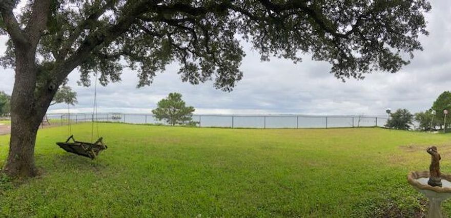 Panoramic view of beautiful Santa Rosa Sound and unspoiled Santa Rosa Island! Perfect sunsets from deck! This one-owner waterfront home features brick construction, stainless-steel appliances, Mission-style cabinetry, bay window, renovated baths (one accessible), crown-moulding throughout, two wood-burning fireplaces, & central vac system!  The large storage area over garage is an added bonus with tons of potential!  Renovate as a Primary Master Suite OR AirBnB OR long-term rental-both with a separate entrance! Spacious bonus room is a great man-cave, playroom or movie room!  Fully-fenced backyard! Workshop/Storage building! Newer seawall!