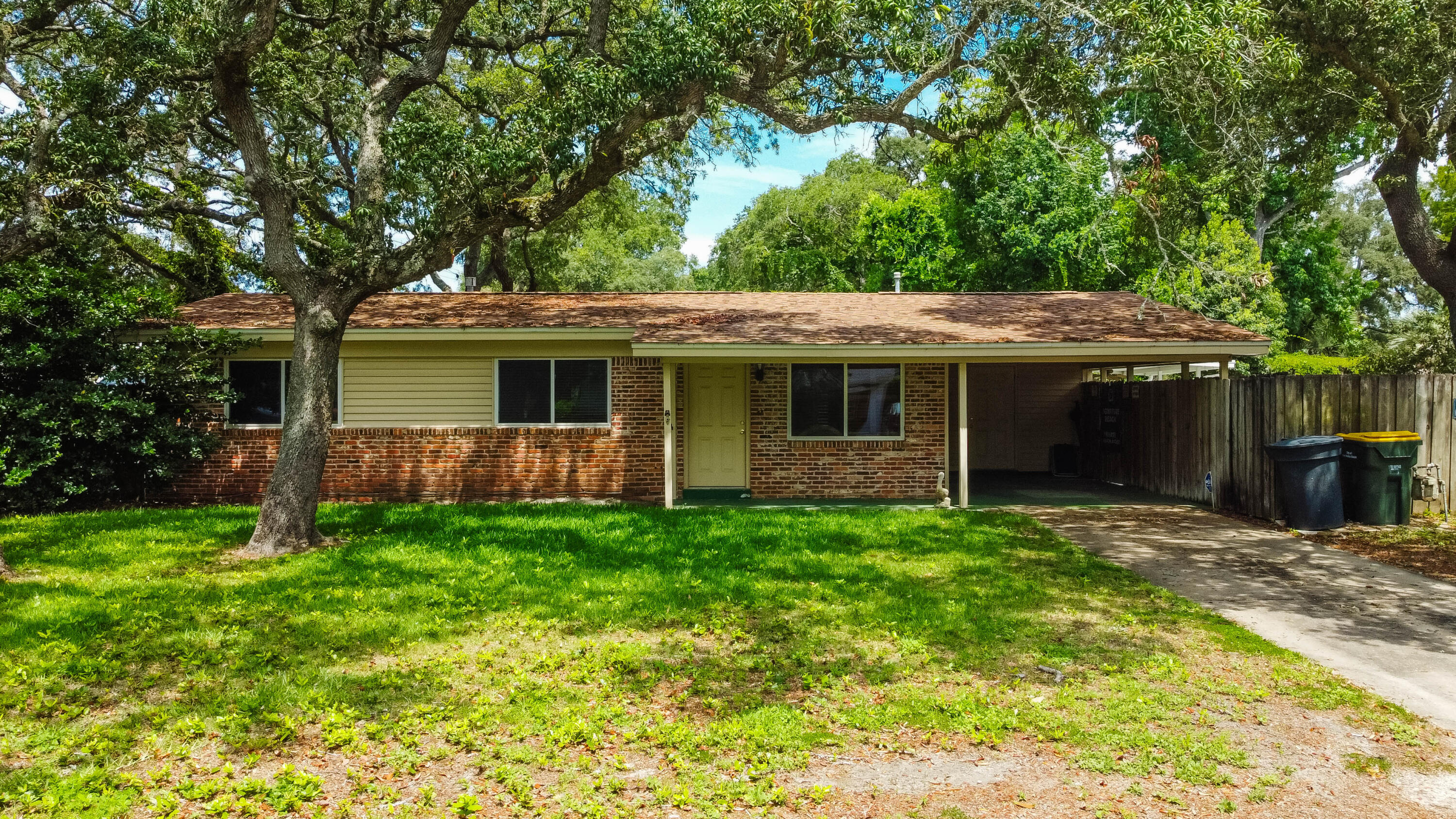 Pool Home under $300K. This 3BR/2.5BA brick home is nestled on a large corner lot in a well established neighborhood. It is centrally located to both bases, downtown, schools and the beautiful emerald green waters of the Gulf of America. The backyard is a private oasis. The sparkling pool, with new pool pump (2025), offers a wonderful way to cool down on those hot summer Florida days. The backyard is fenced and has a great deck for family and friends to gather. Natural gas is already on the property and there is plenty of room for a hot tub. When entertaining outside is not an option, bring the gatherings inside to the large family room with a large stone fireplace. The home was completely rewired in June 2025. The seller's have never occupied the house and it is being sold AS-IS.