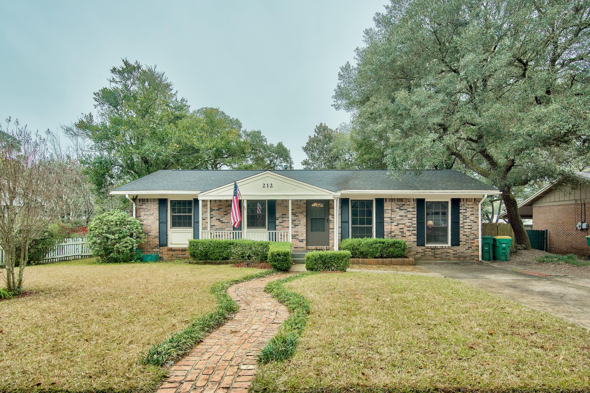 Beautifully maintained home with a HUGE lot in central Niceville! Full brick ranch style home has a large living area with built-ins, 2 FULL bathrooms and lots of room to roam in the PRIVACY-FENCED backyard! Some updates include laminate flooring throughout (no carpet), ceiling fans in every room, fresh paint, French doors, and a covered area on the deck. Enjoy your oversized laundry area off the kitchen, multiple brick and stone patios and a newer storage shed in the backyard! HVAC , roof, heat, and water heater are all less than 7 years old. Great place to call home!